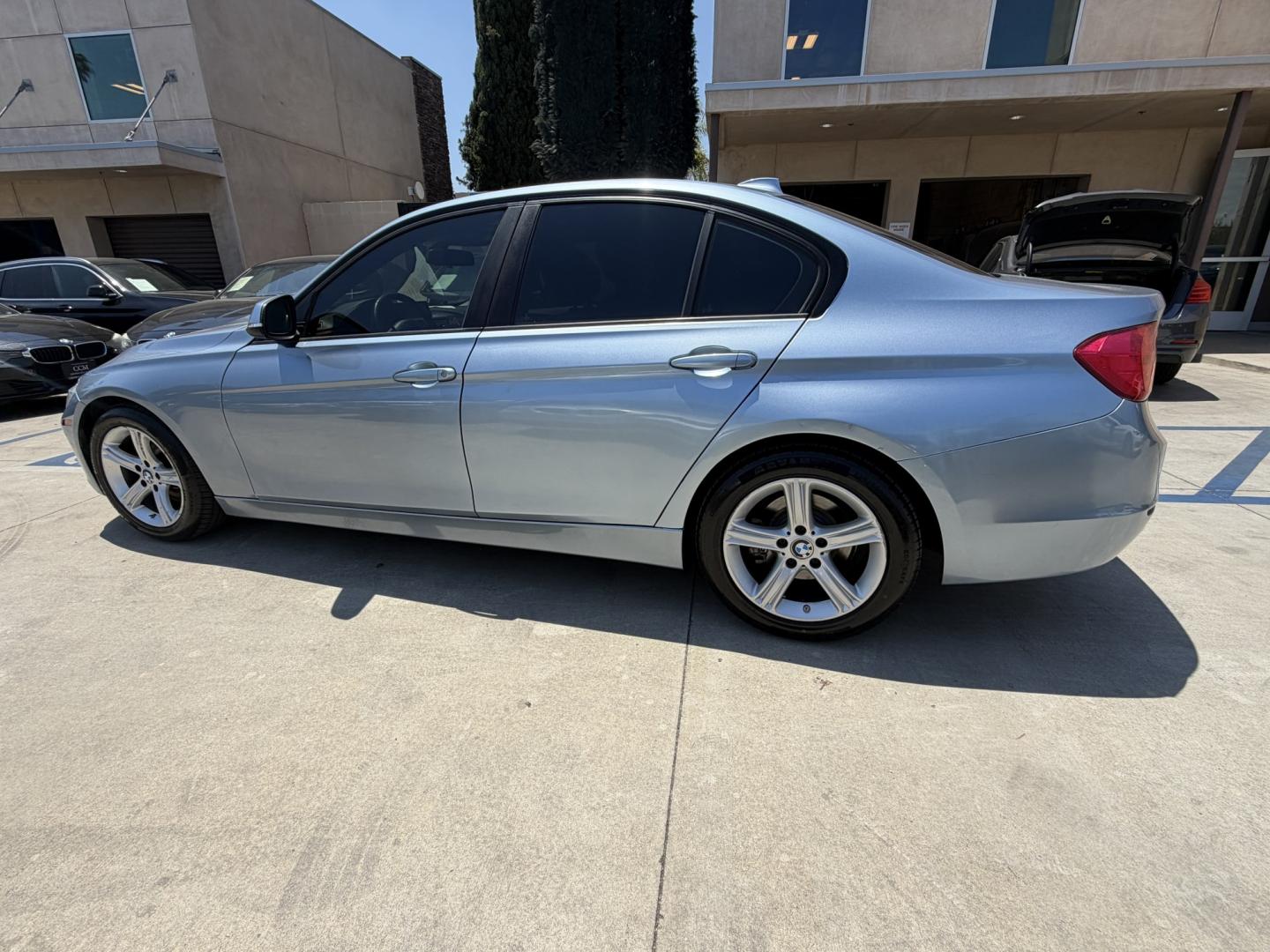 2013 BLUE /black leather BMW 3-Series 328i Sedan (WBA3A5C58DF) with an 2.0L L4 DOHC 16V engine, 8-Speed Automatic transmission, located at 30 S. Berkeley Avenue, Pasadena, CA, 91107, (626) 248-7567, 34.145447, -118.109398 - Looking for a luxurious and high-performing car that comes loaded with all the latest features? Look no further than the 2013 BMW 3-Series 328i Sedan, available at Crown City Motors. This stunning sedan is not only a head-turner on the road, but it also comes with all the latest features that you co - Photo#6