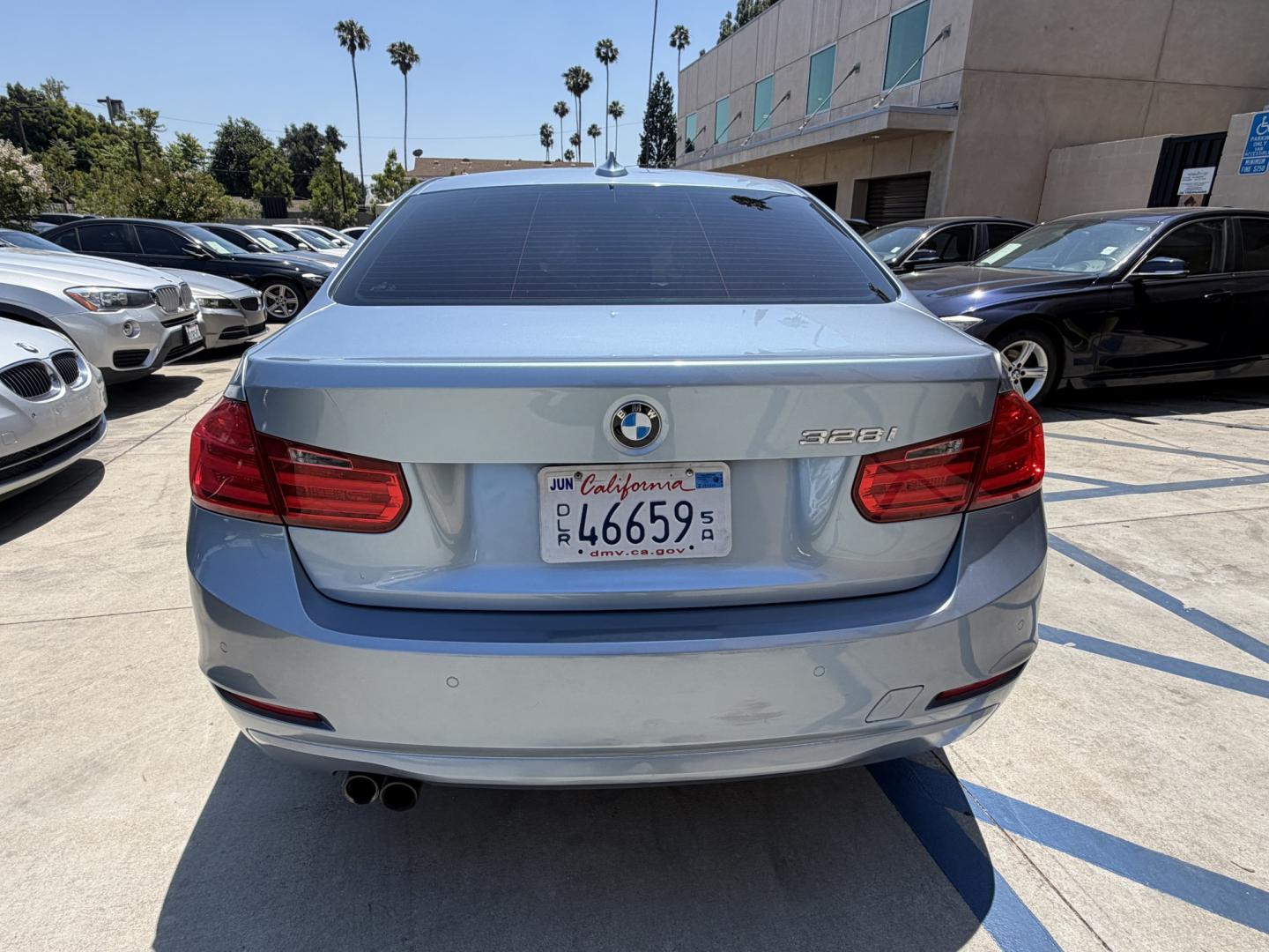 2013 BLUE /black leather BMW 3-Series 328i Sedan (WBA3A5C58DF) with an 2.0L L4 DOHC 16V engine, 8-Speed Automatic transmission, located at 30 S. Berkeley Avenue, Pasadena, CA, 91107, (626) 248-7567, 34.145447, -118.109398 - Looking for a luxurious and high-performing car that comes loaded with all the latest features? Look no further than the 2013 BMW 3-Series 328i Sedan, available at Crown City Motors. This stunning sedan is not only a head-turner on the road, but it also comes with all the latest features that you co - Photo#8