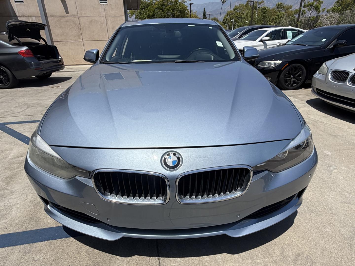 2013 BLUE /black leather BMW 3-Series 328i Sedan (WBA3A5C58DF) with an 2.0L L4 DOHC 16V engine, 8-Speed Automatic transmission, located at 30 S. Berkeley Avenue, Pasadena, CA, 91107, (626) 248-7567, 34.145447, -118.109398 - Looking for a luxurious and high-performing car that comes loaded with all the latest features? Look no further than the 2013 BMW 3-Series 328i Sedan, available at Crown City Motors. This stunning sedan is not only a head-turner on the road, but it also comes with all the latest features that you co - Photo#12