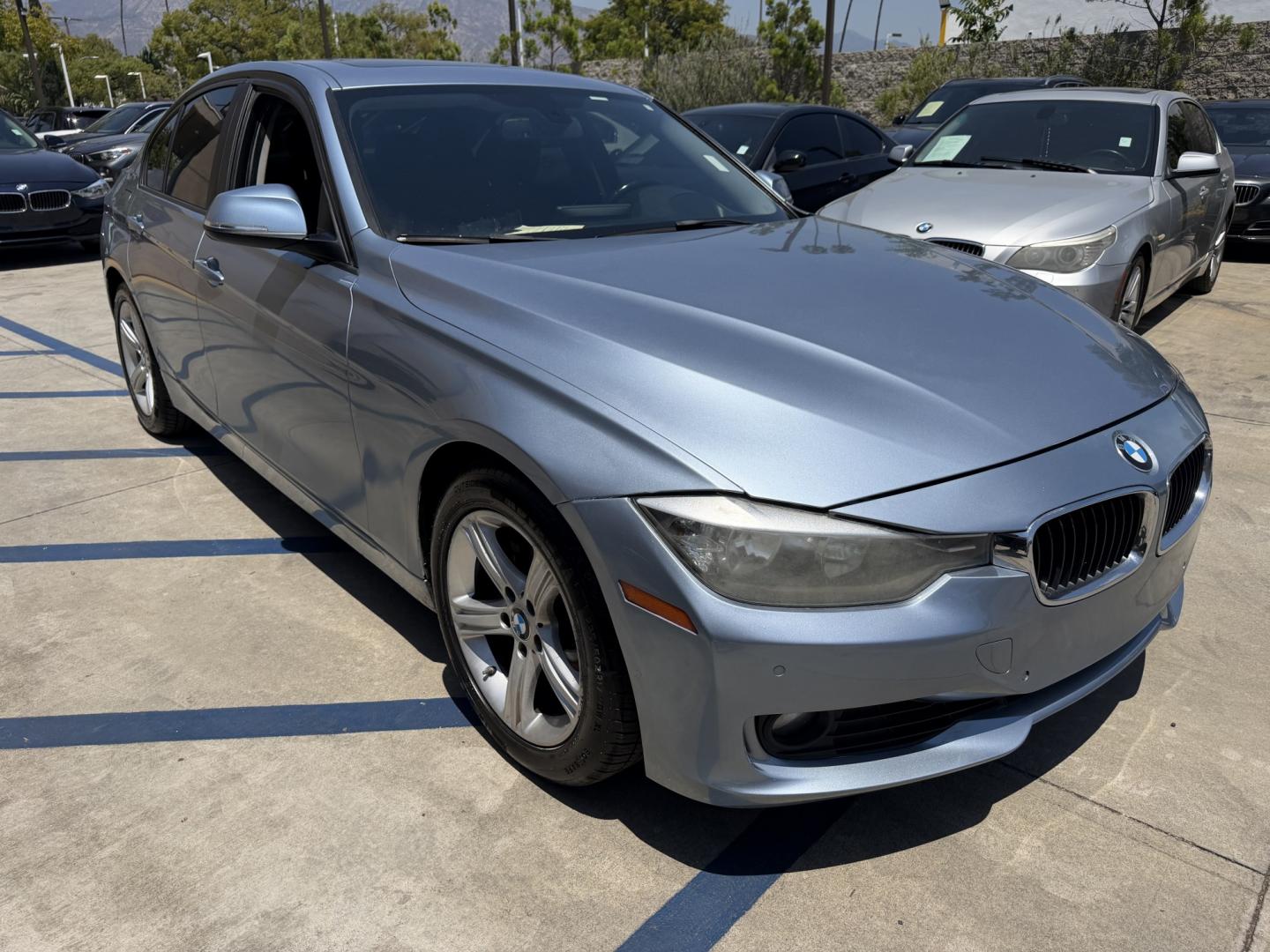 2013 BLUE /black leather BMW 3-Series 328i Sedan (WBA3A5C58DF) with an 2.0L L4 DOHC 16V engine, 8-Speed Automatic transmission, located at 30 S. Berkeley Avenue, Pasadena, CA, 91107, (626) 248-7567, 34.145447, -118.109398 - Looking for a luxurious and high-performing car that comes loaded with all the latest features? Look no further than the 2013 BMW 3-Series 328i Sedan, available at Crown City Motors. This stunning sedan is not only a head-turner on the road, but it also comes with all the latest features that you co - Photo#13