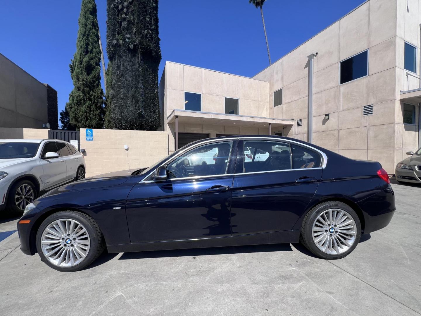 2013 Imperial Blue Metallic /Saddle Brown (Dakota Leather) BMW 3-Series 328i Sedan - SULEV (WBA3C1G51DN) with an 2.0L L4 DOHC 16V engine, Automatic transmission, located at 30 S. Berkeley Avenue, Pasadena, CA, 91107, (626) 248-7567, 34.145447, -118.109398 - 2013 BMW 3 Series Sedan – Buy Here Pay Here Pasadena, CA VIN: WBA3C1G51DNR44018 If you’re looking for a sporty, premium sedan that’s comfortable, efficient, and fun to drive, this 2013 BMW 3 Series is the sweet spot. Available now at Crown City Motors in Pasadena, CA, it delivers that cl - Photo#1