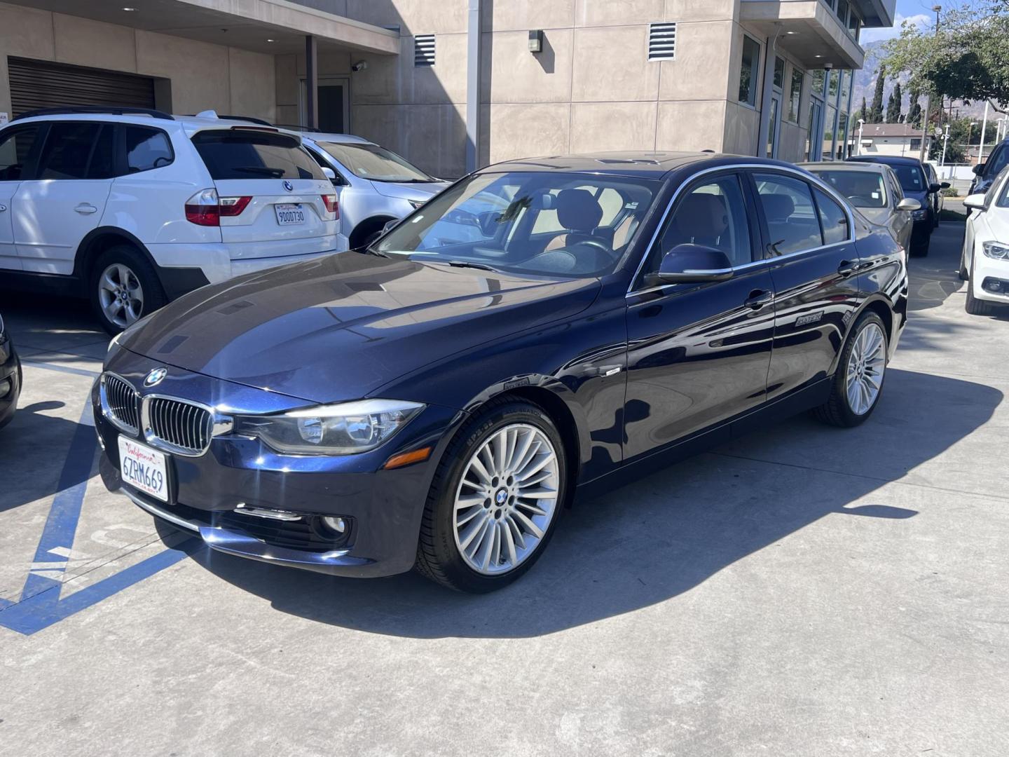 2013 Imperial Blue Metallic /Saddle Brown (Dakota Leather) BMW 3-Series 328i Sedan - SULEV (WBA3C1G51DN) with an 2.0L L4 DOHC 16V engine, Automatic transmission, located at 30 S. Berkeley Avenue, Pasadena, CA, 91107, (626) 248-7567, 34.145447, -118.109398 - 2013 BMW 3 Series Sedan – Buy Here Pay Here Pasadena, CA VIN: WBA3C1G51DNR44018 If you’re looking for a sporty, premium sedan that’s comfortable, efficient, and fun to drive, this 2013 BMW 3 Series is the sweet spot. Available now at Crown City Motors in Pasadena, CA, it delivers that cl - Photo#4