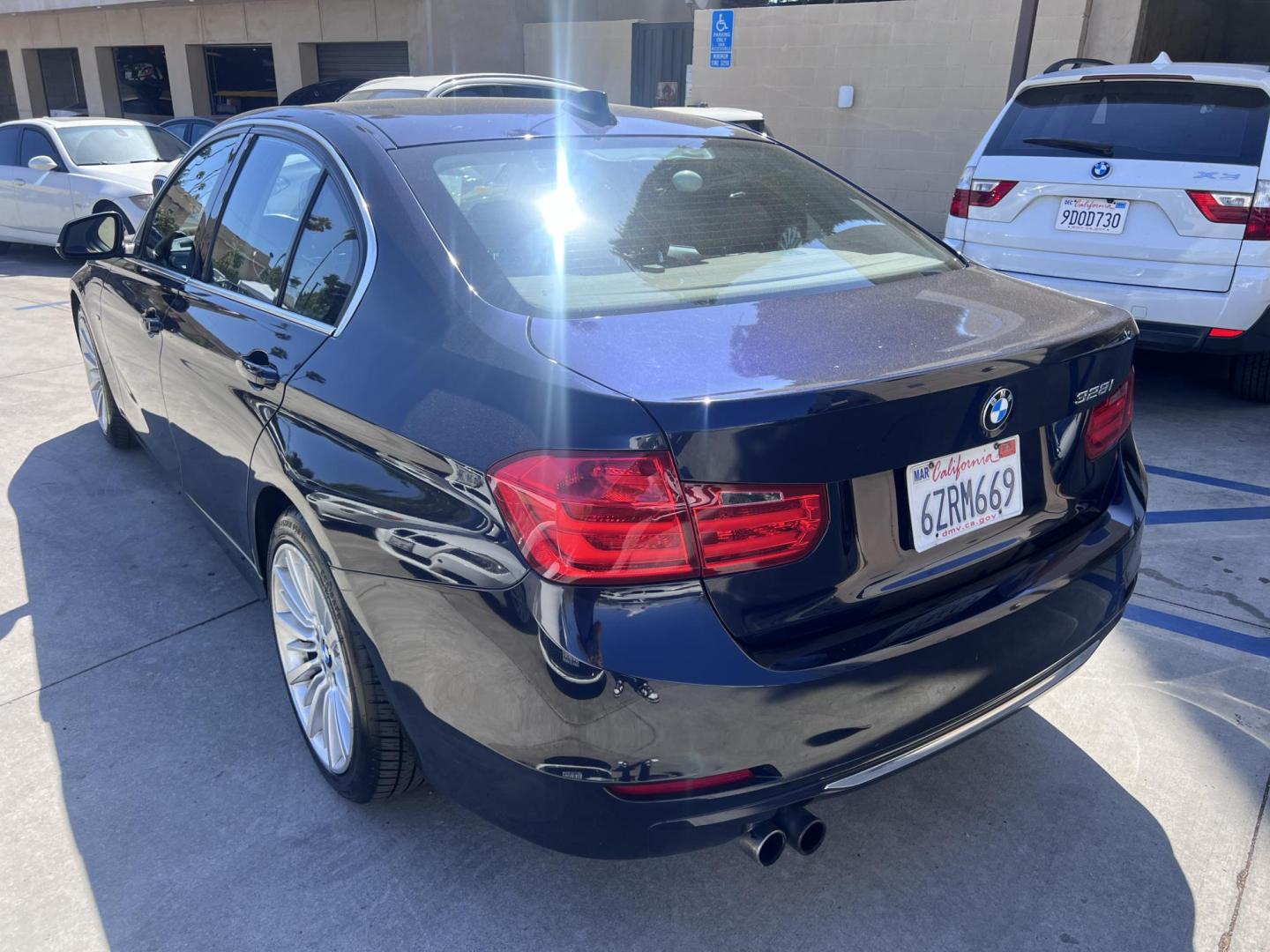 2013 Imperial Blue Metallic /Saddle Brown (Dakota Leather) BMW 3-Series 328i Sedan - SULEV (WBA3C1G51DN) with an 2.0L L4 DOHC 16V engine, Automatic transmission, located at 30 S. Berkeley Avenue, Pasadena, CA, 91107, (626) 248-7567, 34.145447, -118.109398 - 2013 BMW 3 Series Sedan – Buy Here Pay Here Pasadena, CA VIN: WBA3C1G51DNR44018 If you’re looking for a sporty, premium sedan that’s comfortable, efficient, and fun to drive, this 2013 BMW 3 Series is the sweet spot. Available now at Crown City Motors in Pasadena, CA, it delivers that cl - Photo#6