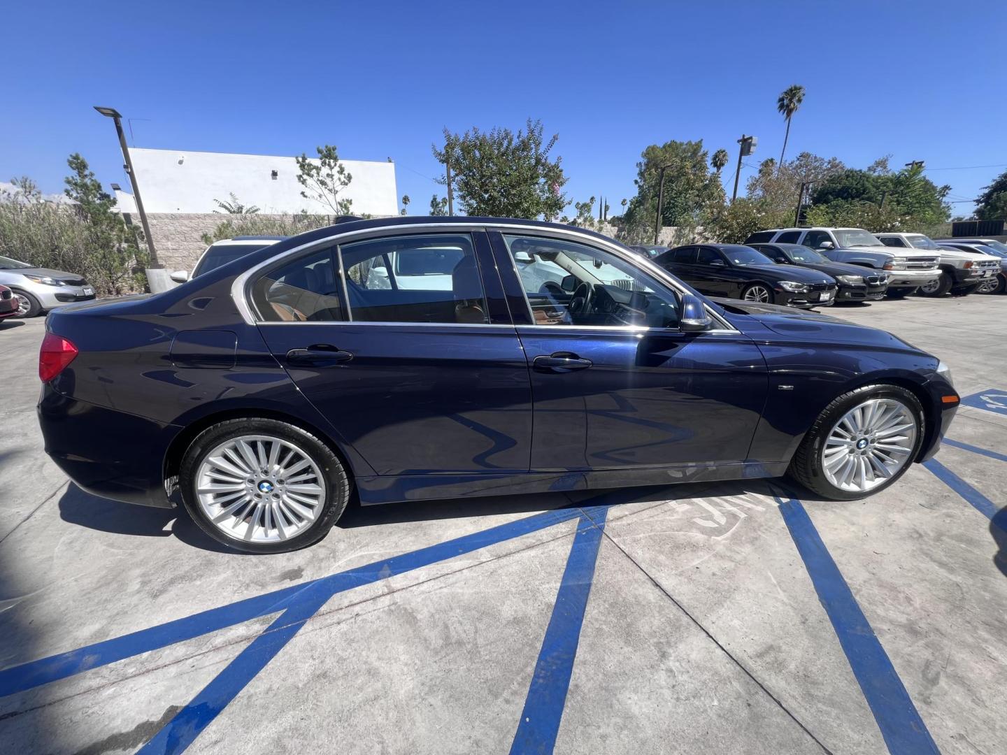 2013 Imperial Blue Metallic /Saddle Brown (Dakota Leather) BMW 3-Series 328i Sedan - SULEV (WBA3C1G51DN) with an 2.0L L4 DOHC 16V engine, Automatic transmission, located at 30 S. Berkeley Avenue, Pasadena, CA, 91107, (626) 248-7567, 34.145447, -118.109398 - 2013 BMW 3 Series Sedan – Buy Here Pay Here Pasadena, CA VIN: WBA3C1G51DNR44018 If you’re looking for a sporty, premium sedan that’s comfortable, efficient, and fun to drive, this 2013 BMW 3 Series is the sweet spot. Available now at Crown City Motors in Pasadena, CA, it delivers that cl - Photo#8