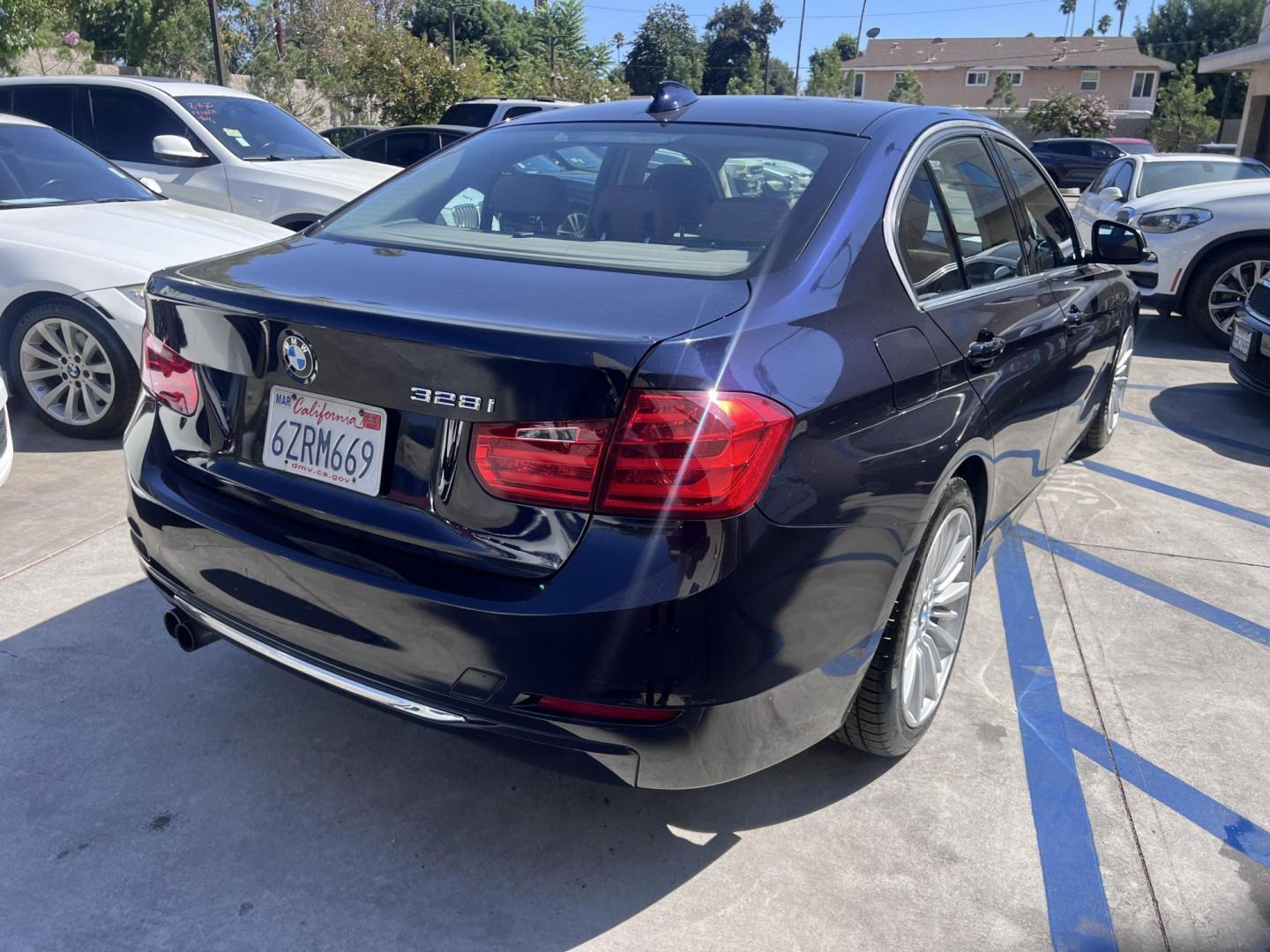 2013 Imperial Blue Metallic /Saddle Brown (Dakota Leather) BMW 3-Series 328i Sedan - SULEV (WBA3C1G51DN) with an 2.0L L4 DOHC 16V engine, Automatic transmission, located at 30 S. Berkeley Avenue, Pasadena, CA, 91107, (626) 248-7567, 34.145447, -118.109398 - 2013 BMW 3 Series Sedan – Buy Here Pay Here Pasadena, CA VIN: WBA3C1G51DNR44018 If you’re looking for a sporty, premium sedan that’s comfortable, efficient, and fun to drive, this 2013 BMW 3 Series is the sweet spot. Available now at Crown City Motors in Pasadena, CA, it delivers that cl - Photo#9
