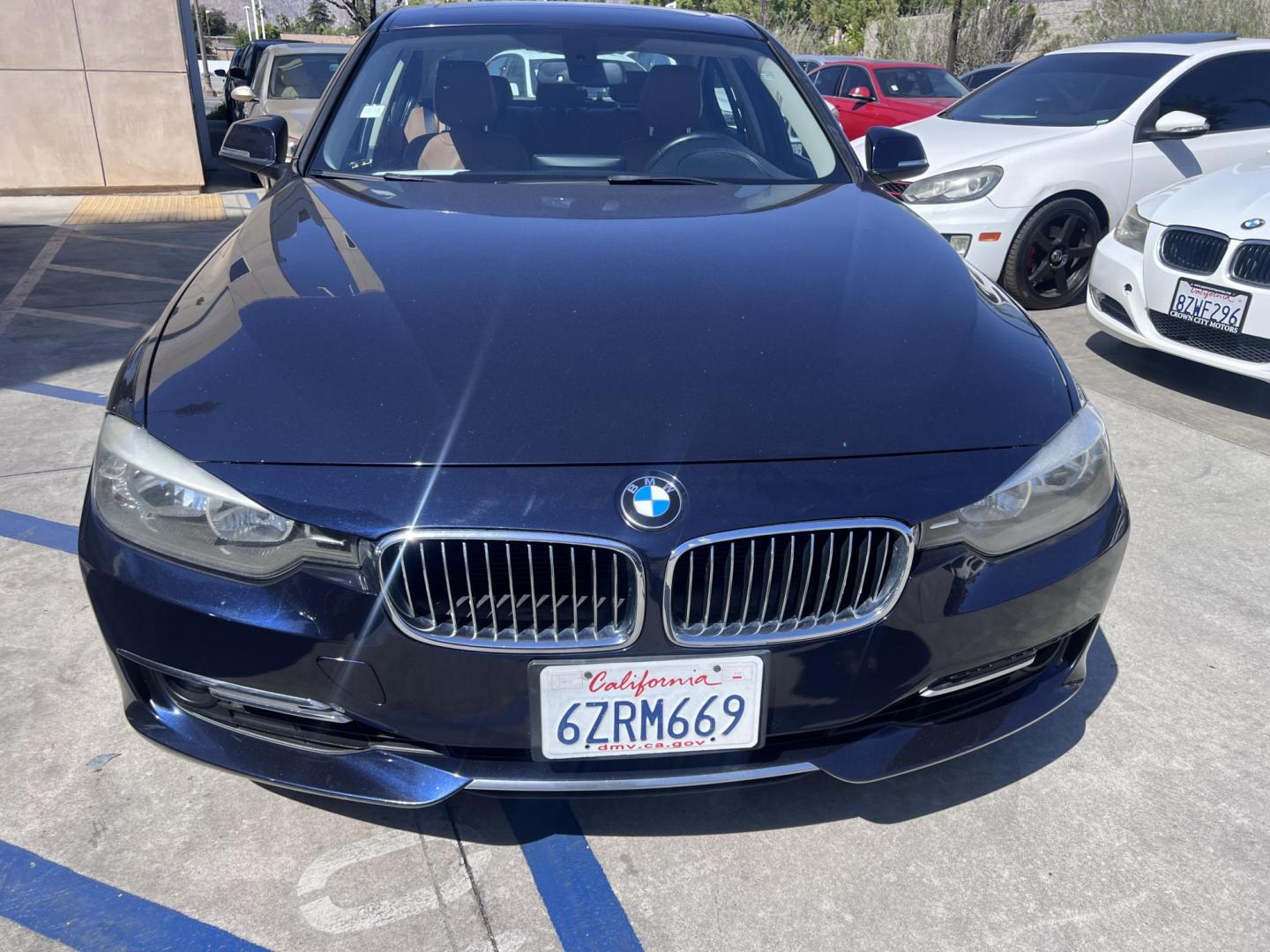 2013 Imperial Blue Metallic /Saddle Brown (Dakota Leather) BMW 3-Series 328i Sedan - SULEV (WBA3C1G51DN) with an 2.0L L4 DOHC 16V engine, Automatic transmission, located at 30 S. Berkeley Avenue, Pasadena, CA, 91107, (626) 248-7567, 34.145447, -118.109398 - 2013 BMW 3 Series Sedan – Buy Here Pay Here Pasadena, CA VIN: WBA3C1G51DNR44018 If you’re looking for a sporty, premium sedan that’s comfortable, efficient, and fun to drive, this 2013 BMW 3 Series is the sweet spot. Available now at Crown City Motors in Pasadena, CA, it delivers that cl - Photo#13