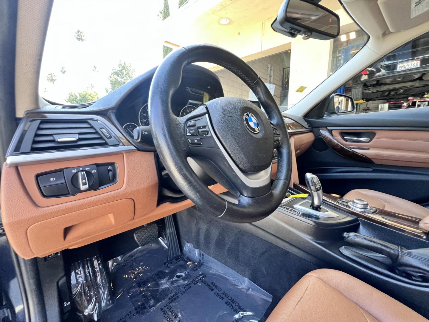 2013 Imperial Blue Metallic /Saddle Brown (Dakota Leather) BMW 3-Series 328i Sedan - SULEV (WBA3C1G51DN) with an 2.0L L4 DOHC 16V engine, Automatic transmission, located at 30 S. Berkeley Avenue, Pasadena, CA, 91107, (626) 248-7567, 34.145447, -118.109398 - 2013 BMW 3 Series Sedan – Buy Here Pay Here Pasadena, CA VIN: WBA3C1G51DNR44018 If you’re looking for a sporty, premium sedan that’s comfortable, efficient, and fun to drive, this 2013 BMW 3 Series is the sweet spot. Available now at Crown City Motors in Pasadena, CA, it delivers that cl - Photo#15