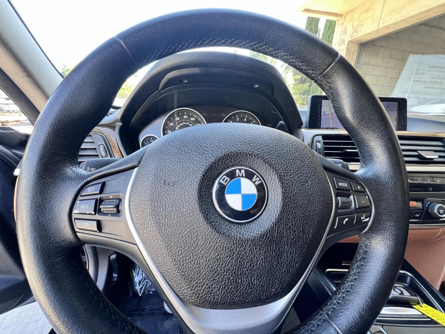 2013 Imperial Blue Metallic /Saddle Brown (Dakota Leather) BMW 3-Series 328i Sedan - SULEV (WBA3C1G51DN) with an 2.0L L4 DOHC 16V engine, Automatic transmission, located at 30 S. Berkeley Avenue, Pasadena, CA, 91107, (626) 248-7567, 34.145447, -118.109398 - 2013 BMW 3 Series Sedan – Buy Here Pay Here Pasadena, CA VIN: WBA3C1G51DNR44018 If you’re looking for a sporty, premium sedan that’s comfortable, efficient, and fun to drive, this 2013 BMW 3 Series is the sweet spot. Available now at Crown City Motors in Pasadena, CA, it delivers that cl - Photo#29