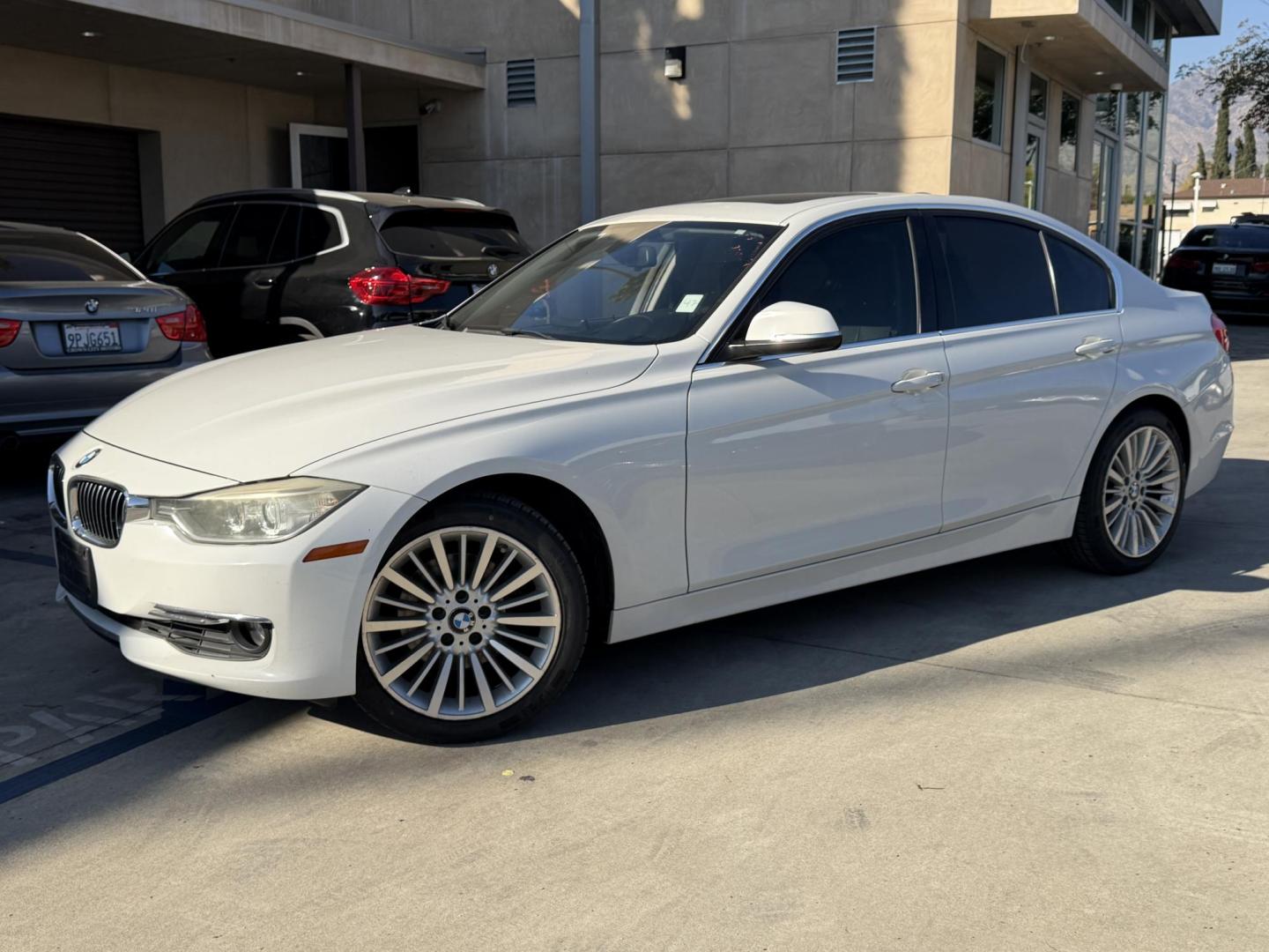 2013 White /black BMW 3-Series 328i xDrive Sedan (WBA3B3C58DF) with an 2.0L L4 DOHC 16V engine, located at 30 S. Berkeley Avenue, Pasadena, CA, 91107, (626) 248-7567, 34.145447, -118.109398 - Crown City Motors is a used “Buy Here Pay Here” car dealer in Pasadena CA. “Buy Here Pay Here” financing, means that when you purchase your vehicle from our dealership, that you make the payments to the dealership as well. We do not need the banks approval to get you approved for a used auto- Photo#0