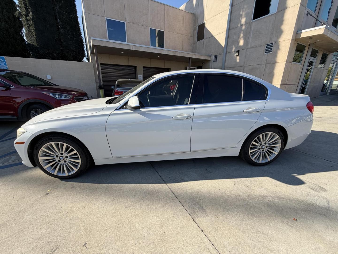 2013 White /black BMW 3-Series 328i xDrive Sedan (WBA3B3C58DF) with an 2.0L L4 DOHC 16V engine, located at 30 S. Berkeley Avenue, Pasadena, CA, 91107, (626) 248-7567, 34.145447, -118.109398 - Crown City Motors is a used “Buy Here Pay Here” car dealer in Pasadena CA. “Buy Here Pay Here” financing, means that when you purchase your vehicle from our dealership, that you make the payments to the dealership as well. We do not need the banks approval to get you approved for a used auto- Photo#1