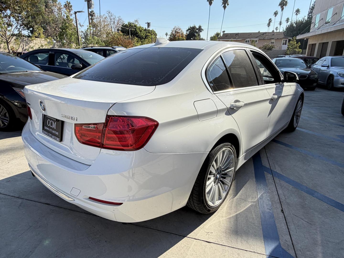 2013 White /black BMW 3-Series 328i xDrive Sedan (WBA3B3C58DF) with an 2.0L L4 DOHC 16V engine, located at 30 S. Berkeley Avenue, Pasadena, CA, 91107, (626) 248-7567, 34.145447, -118.109398 - Crown City Motors is a used “Buy Here Pay Here” car dealer in Pasadena CA. “Buy Here Pay Here” financing, means that when you purchase your vehicle from our dealership, that you make the payments to the dealership as well. We do not need the banks approval to get you approved for a used auto- Photo#2