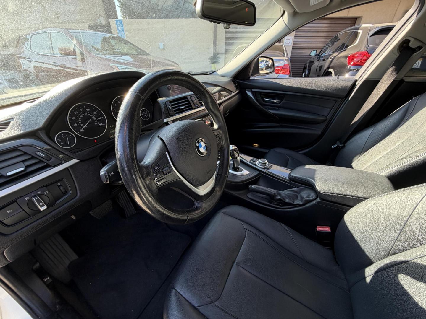 2013 White /black BMW 3-Series 328i xDrive Sedan (WBA3B3C58DF) with an 2.0L L4 DOHC 16V engine, located at 30 S. Berkeley Avenue, Pasadena, CA, 91107, (626) 248-7567, 34.145447, -118.109398 - Crown City Motors is a used “Buy Here Pay Here” car dealer in Pasadena CA. “Buy Here Pay Here” financing, means that when you purchase your vehicle from our dealership, that you make the payments to the dealership as well. We do not need the banks approval to get you approved for a used auto- Photo#6
