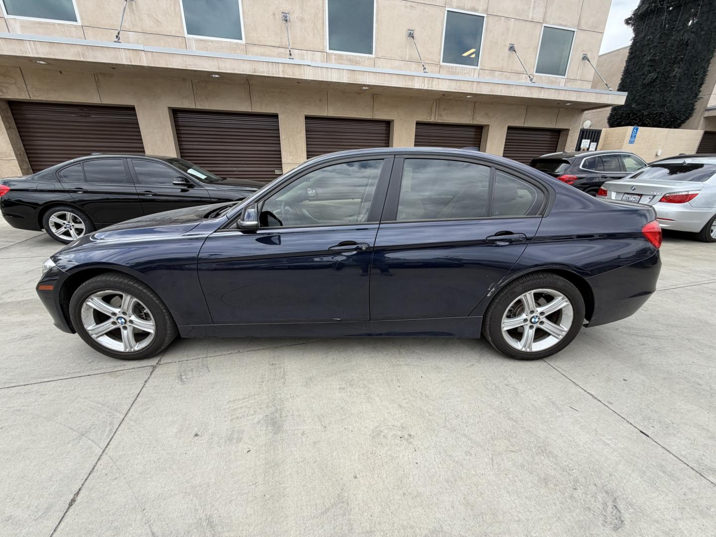 2013 BLUE BMW 3-Series 320i Sedan (WBA3B1C54DF) with an 2.0L L4 DOHC 16V engine, located at 30 S. Berkeley Avenue, Pasadena, CA, 91107, (626) 248-7567, 34.145447, -118.109398 - Photo#1