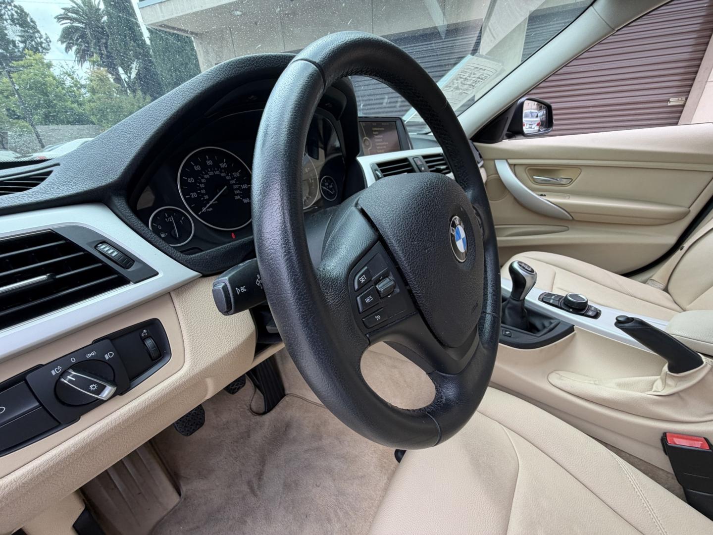 2013 BLUE BMW 3-Series 320i Sedan (WBA3B1C54DF) with an 2.0L L4 DOHC 16V engine, located at 30 S. Berkeley Avenue, Pasadena, CA, 91107, (626) 248-7567, 34.145447, -118.109398 - Photo#8