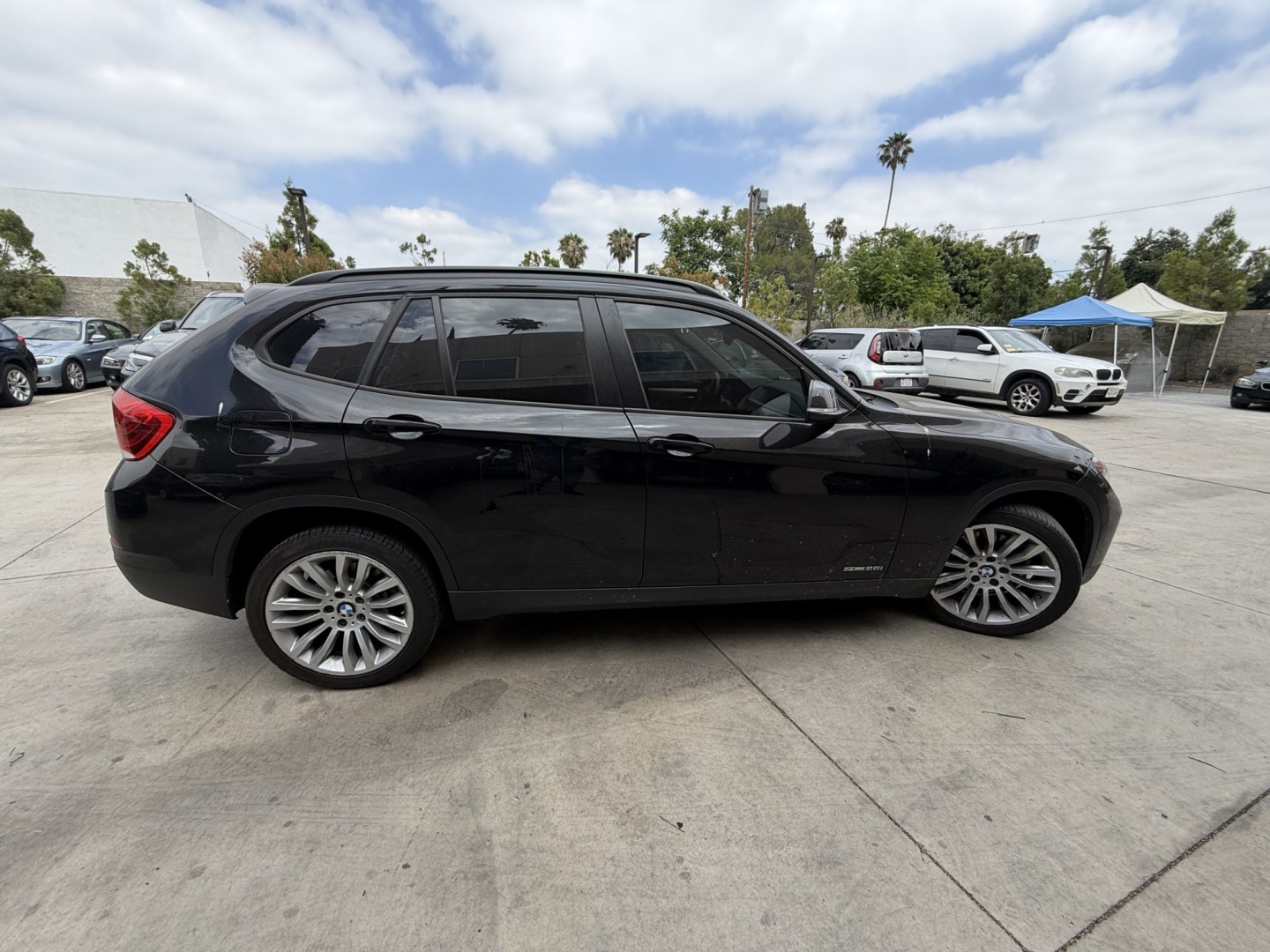 2013 Deep Sea Blue Metallic /Black BMW X1 xDrive28i (WBAVL1C56DV) with an 2.0L L4 DOHC 16V engine, 8-Speed Automatic transmission, located at 30 S. Berkeley Avenue, Pasadena, CA, 91107, (626) 248-7567, 34.145447, -118.109398 - # 2013 BMW X1 xDrive28i for Sale in Pasadena, CA – Buy Here Pay Here Financing Available If you're looking for a luxury crossover SUV that offers BMW performance, all-wheel-drive capability, premium comfort, and flexible financing options, this 2013 BMW X1 xDrive28i is an excellent choice. Avai- Photo#2