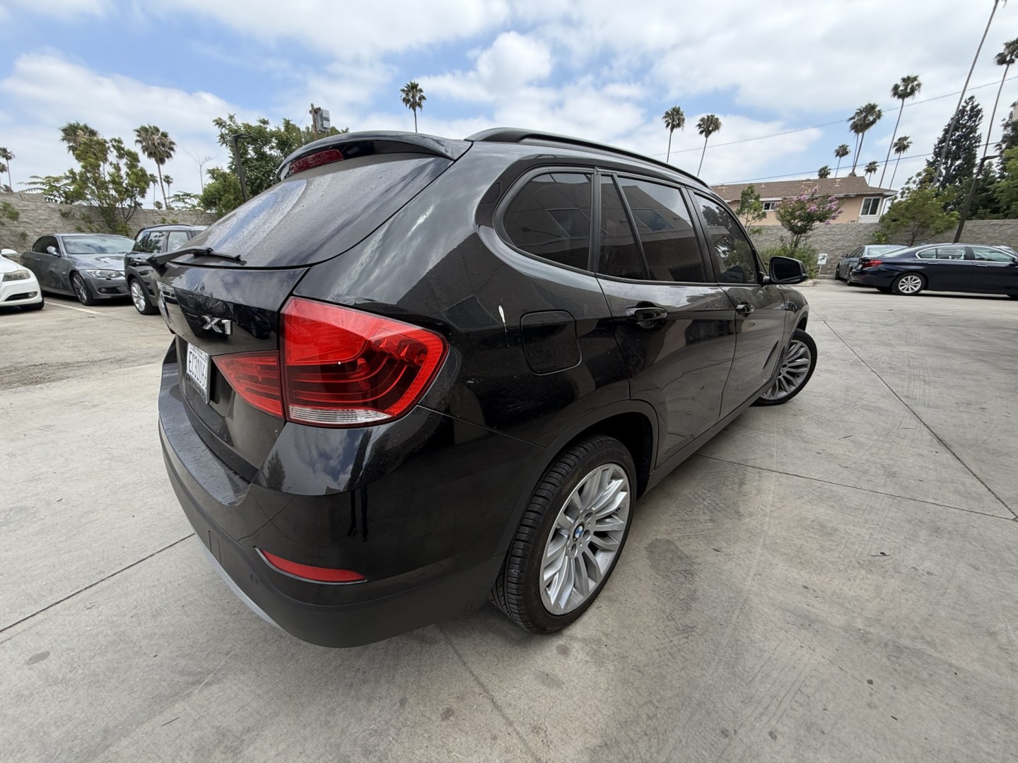 2013 Deep Sea Blue Metallic /Black BMW X1 xDrive28i (WBAVL1C56DV) with an 2.0L L4 DOHC 16V engine, 8-Speed Automatic transmission, located at 30 S. Berkeley Avenue, Pasadena, CA, 91107, (626) 248-7567, 34.145447, -118.109398 - # 2013 BMW X1 xDrive28i for Sale in Pasadena, CA – Buy Here Pay Here Financing Available If you're looking for a luxury crossover SUV that offers BMW performance, all-wheel-drive capability, premium comfort, and flexible financing options, this 2013 BMW X1 xDrive28i is an excellent choice. Avai- Photo#3