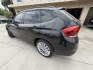 2013 Deep Sea Blue Metallic /Black BMW X1 xDrive28i (WBAVL1C56DV) with an 2.0L L4 DOHC 16V engine, 8-Speed Automatic transmission, located at 30 S. Berkeley Avenue, Pasadena, CA, 91107, (626) 248-7567, 34.145447, -118.109398 - # 2013 BMW X1 xDrive28i for Sale in Pasadena, CA – Buy Here Pay Here Financing Available If you're looking for a luxury crossover SUV that offers BMW performance, all-wheel-drive capability, premium comfort, and flexible financing options, this 2013 BMW X1 xDrive28i is an excellent choice. Avai- Photo#4