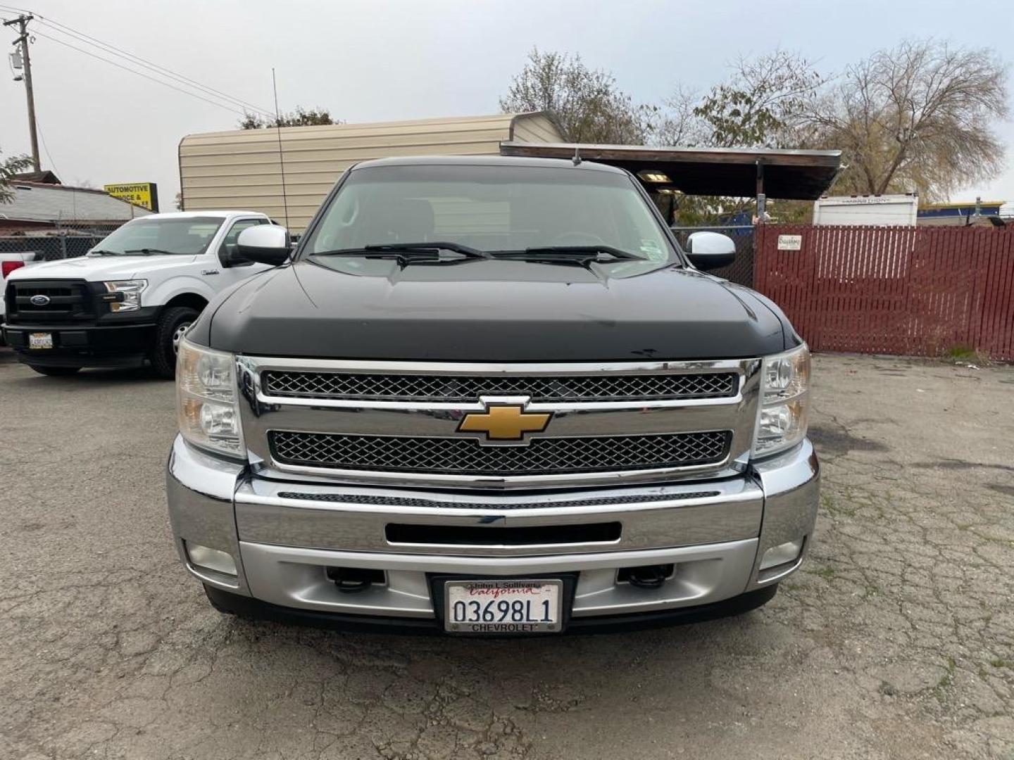 2013 Black Chevrolet Silverado 1500 LT (3GCPKSE78DG) with an 5.3L Vortec 5.3L Flex Fuel V8 315hp 335ft. lbs. Other engine, 6-Speed Shiftable Automatic transmission, located at 800 Riverside Ave, Roseville, CA, 95678, 916-773-4549 & Toll Free: 866-719-4393, 38.732265, -121.291039 - CREW CAB 4X4 LT LOW MILES SERVICE RECORDS ON CLEAN CARFAX - Photo#7