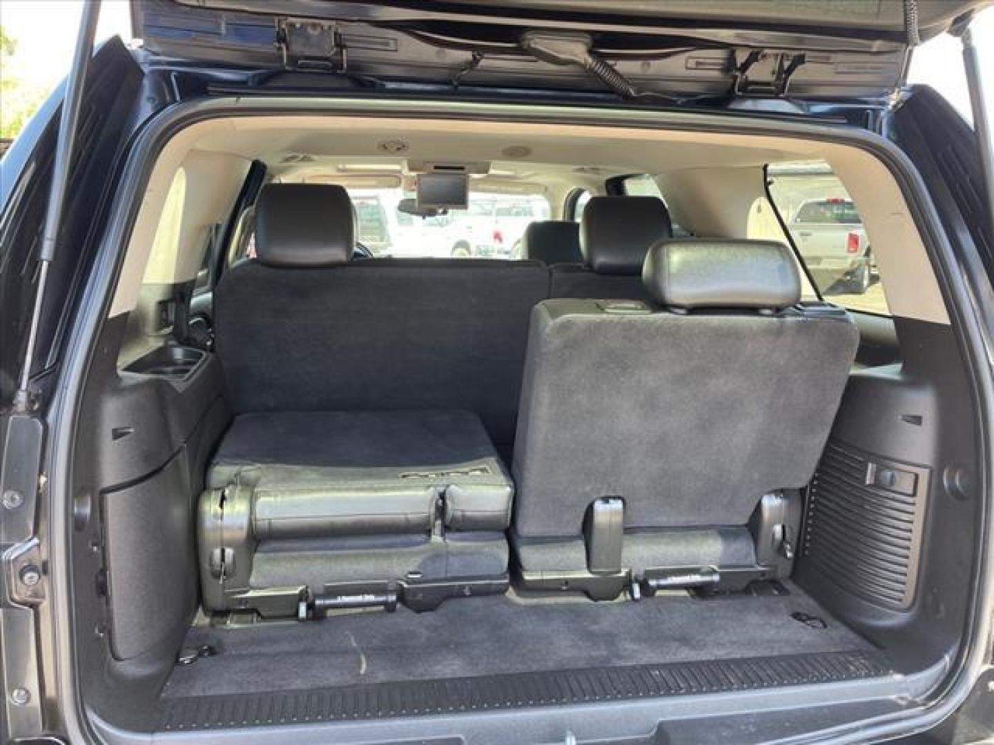 2013 Black Chevrolet Tahoe LT (1GNSKBE04DR) with an 5.3L Vortec Iron Block 5.3L Fl Other engine, 6-Speed Shiftable Automatic transmission, located at 800 Riverside Ave, Roseville, CA, 95678, 916-773-4549 & Toll Free: 866-719-4393, 38.732265, -121.291039 - 4X4 LT CUSTOM WHEELS DVD MOON ROOF LEATHER - Photo#9