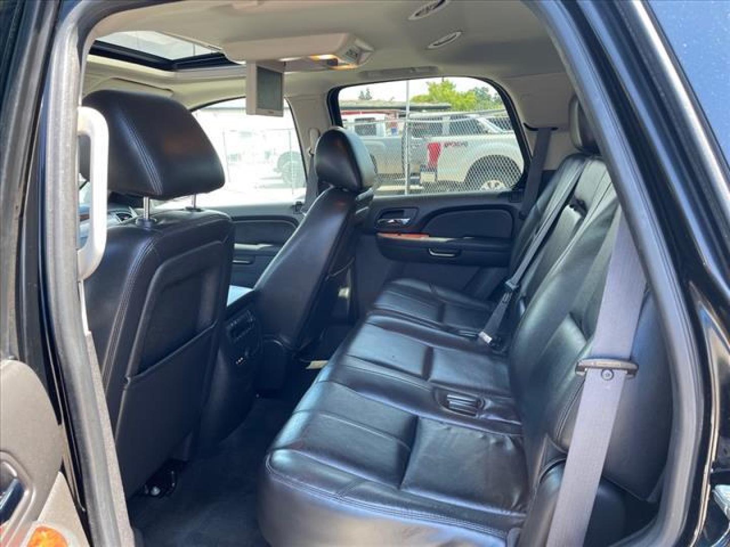 2013 Black Chevrolet Tahoe LT (1GNSKBE04DR) with an 5.3L Vortec Iron Block 5.3L Fl Other engine, 6-Speed Shiftable Automatic transmission, located at 800 Riverside Ave, Roseville, CA, 95678, 916-773-4549 & Toll Free: 866-719-4393, 38.732265, -121.291039 - 4X4 LT CUSTOM WHEELS DVD MOON ROOF LEATHER - Photo#13