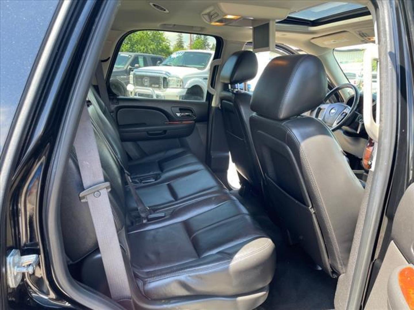 2013 Black Chevrolet Tahoe LT (1GNSKBE04DR) with an 5.3L Vortec Iron Block 5.3L Fl Other engine, 6-Speed Shiftable Automatic transmission, located at 800 Riverside Ave, Roseville, CA, 95678, 916-773-4549 & Toll Free: 866-719-4393, 38.732265, -121.291039 - 4X4 LT CUSTOM WHEELS DVD MOON ROOF LEATHER - Photo#15