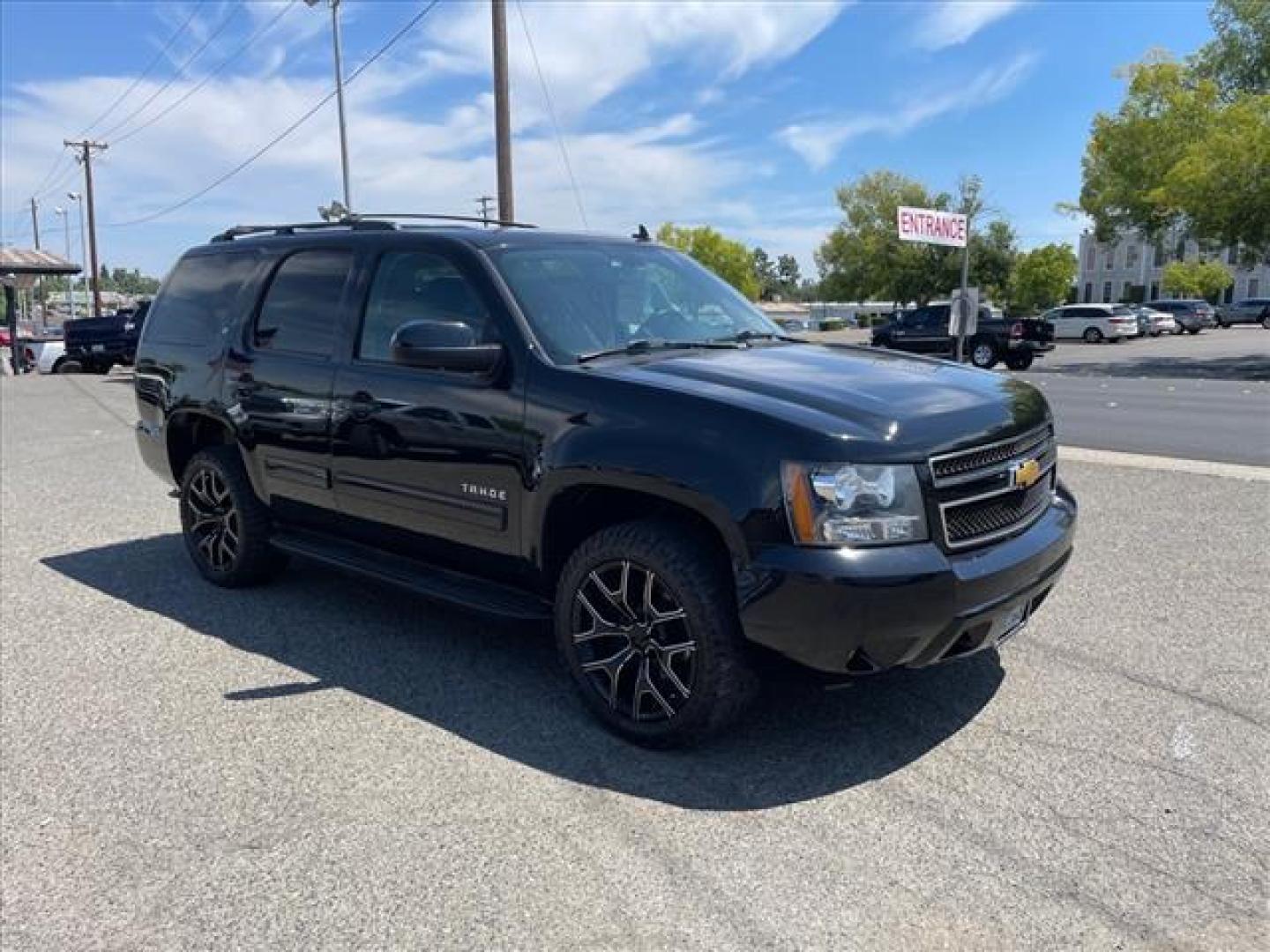 2013 Black Chevrolet Tahoe LT (1GNSKBE04DR) with an 5.3L Vortec Iron Block 5.3L Fl Other engine, 6-Speed Shiftable Automatic transmission, located at 800 Riverside Ave, Roseville, CA, 95678, 916-773-4549 & Toll Free: 866-719-4393, 38.732265, -121.291039 - 4X4 LT CUSTOM WHEELS DVD MOON ROOF LEATHER - Photo#1