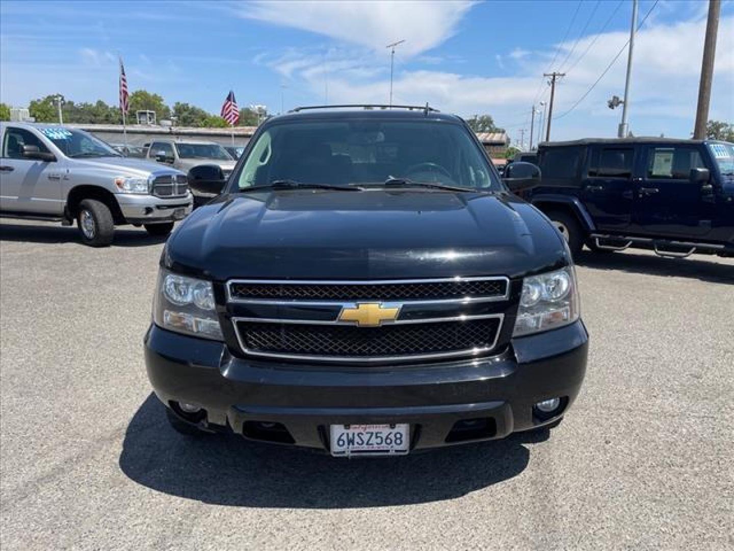 2013 Black Chevrolet Tahoe LT (1GNSKBE04DR) with an 5.3L Vortec Iron Block 5.3L Fl Other engine, 6-Speed Shiftable Automatic transmission, located at 800 Riverside Ave, Roseville, CA, 95678, 916-773-4549 & Toll Free: 866-719-4393, 38.732265, -121.291039 - 4X4 LT CUSTOM WHEELS DVD MOON ROOF LEATHER - Photo#7