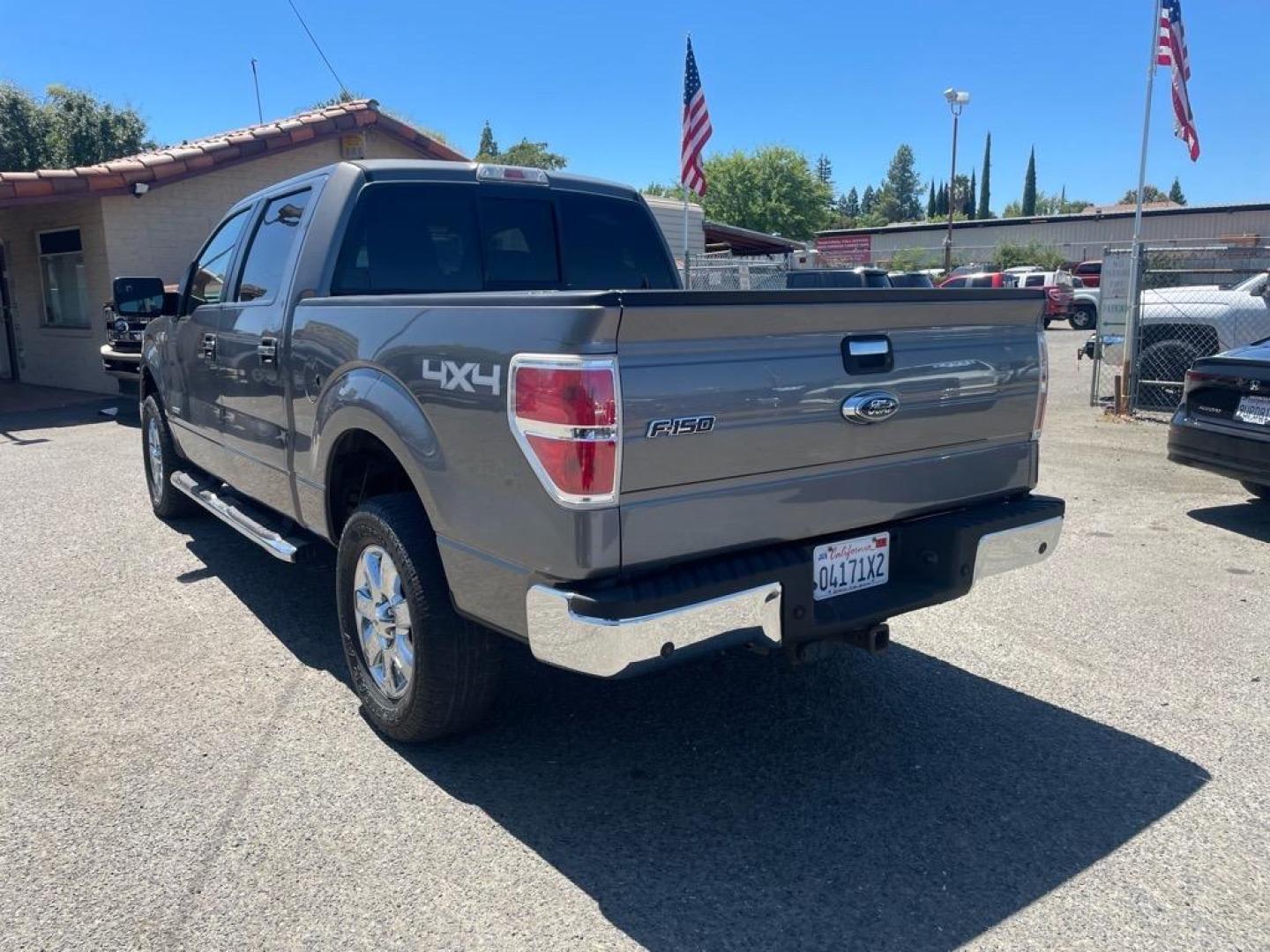 2013 Sterling Gray Metallic Ford F-150 XLT (1FTFW1ET6DK) with an 3.5L EcoBoost 3.5L Twin Turbo V6 365hp 420ft. lbs. Direct Injection engine, 6-Speed Automatic transmission, located at 800 Riverside Ave, Roseville, CA, 95678, 916-773-4549 & Toll Free: 866-719-4393, 38.732265, -121.291039 - 4X4 SUPERCREW XLT ECO BOOST LOW MILES SERVICE RECORDS - Photo#2