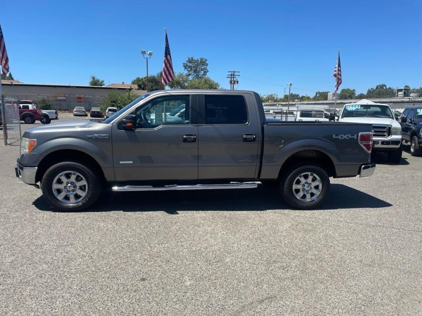 2013 Sterling Gray Metallic Ford F-150 XLT (1FTFW1ET6DK) with an 3.5L EcoBoost 3.5L Twin Turbo V6 365hp 420ft. lbs. Direct Injection engine, 6-Speed Automatic transmission, located at 800 Riverside Ave, Roseville, CA, 95678, 916-773-4549 & Toll Free: 866-719-4393, 38.732265, -121.291039 - 4X4 SUPERCREW XLT ECO BOOST LOW MILES SERVICE RECORDS - Photo#4