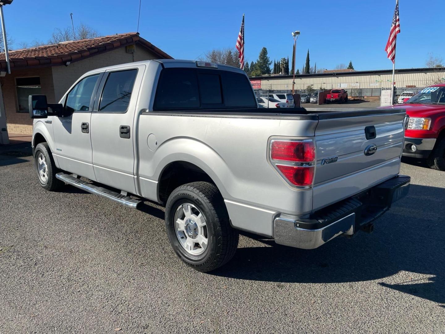 2013 Ingot Silver Metallic Ford F-150 XLT (1FTFW1ET3DF) with an 3.5L EcoBoost 3.5L Twin Turbo V6 365hp 420ft. lbs. Direct Injection engine, 6-Speed Automatic transmission, located at 800 Riverside Ave, Roseville, CA, 95678, 916-773-4549 & Toll Free: 866-719-4393, 38.732265, -121.291039 - 4X4 SUPERCREW XLT ONE OWNER SERVICE RECORDS - Photo#2