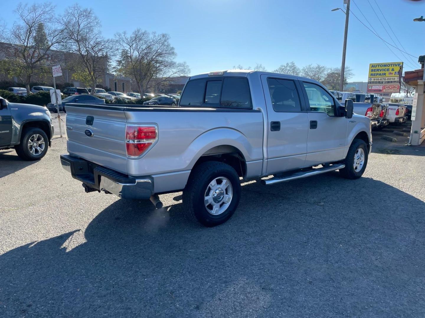 2013 Ingot Silver Metallic Ford F-150 XLT (1FTFW1ET3DF) with an 3.5L EcoBoost 3.5L Twin Turbo V6 365hp 420ft. lbs. Direct Injection engine, 6-Speed Automatic transmission, located at 800 Riverside Ave, Roseville, CA, 95678, 916-773-4549 & Toll Free: 866-719-4393, 38.732265, -121.291039 - 4X4 SUPERCREW XLT ONE OWNER SERVICE RECORDS - Photo#3