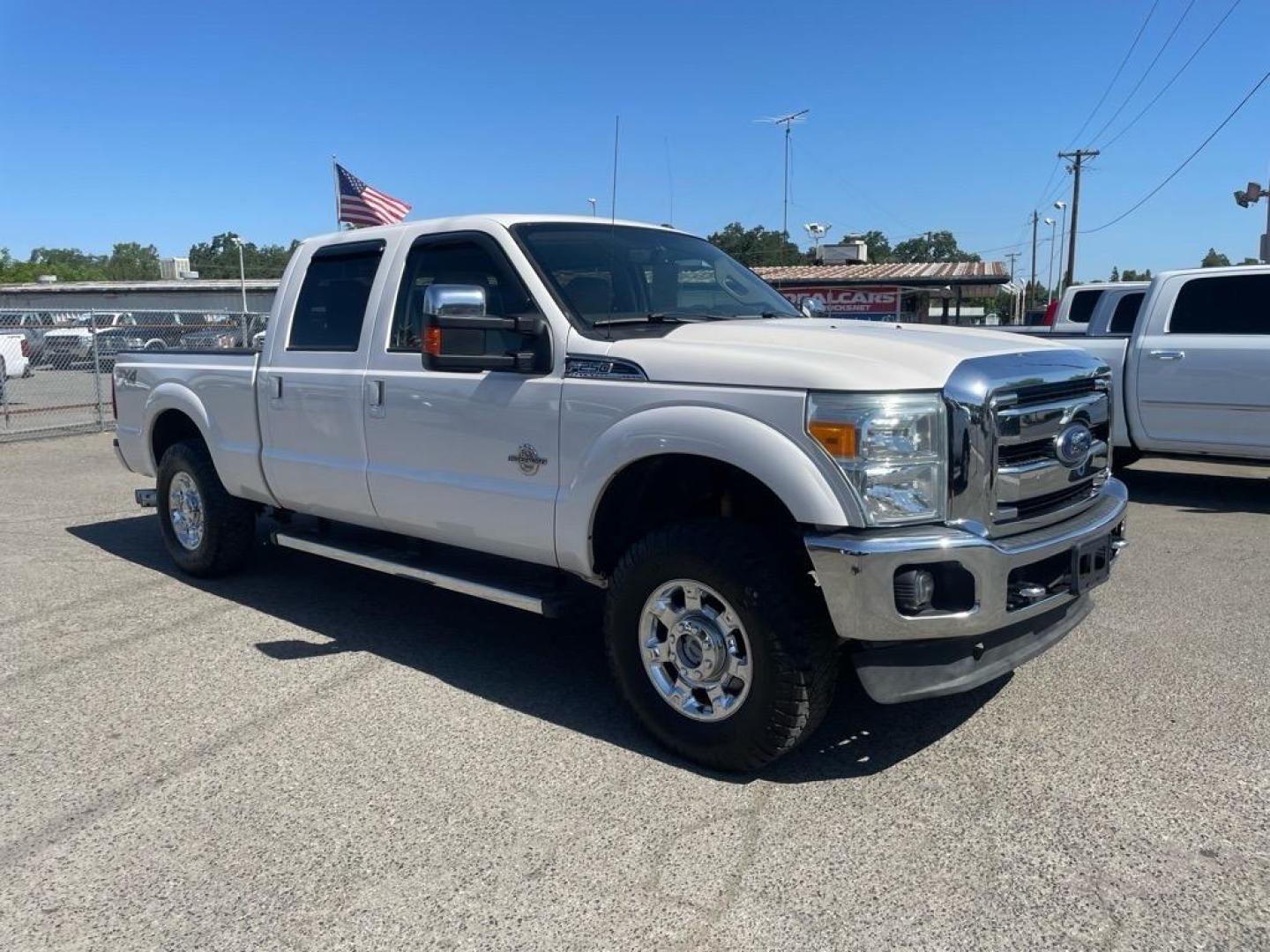 2013 Oxford White Ford F-250 Super Duty Lariat (1FT7W2BT4DE) with an 6.7L Power Stroke 6.7L Biodiesel Turbo V8 400hp 800ft. lbs. Common Rail Direct Injection engine, 6-Speed Shiftable Automatic transmission, located at 800 Riverside Ave, Roseville, CA, 95678, 916-773-4549 & Toll Free: 866-719-4393, 38.732265, -121.291039 - DIESEL CREW CAB 4X4 FX4 LARIAT MOON ROOF SERVICE RECORDS - Photo#1