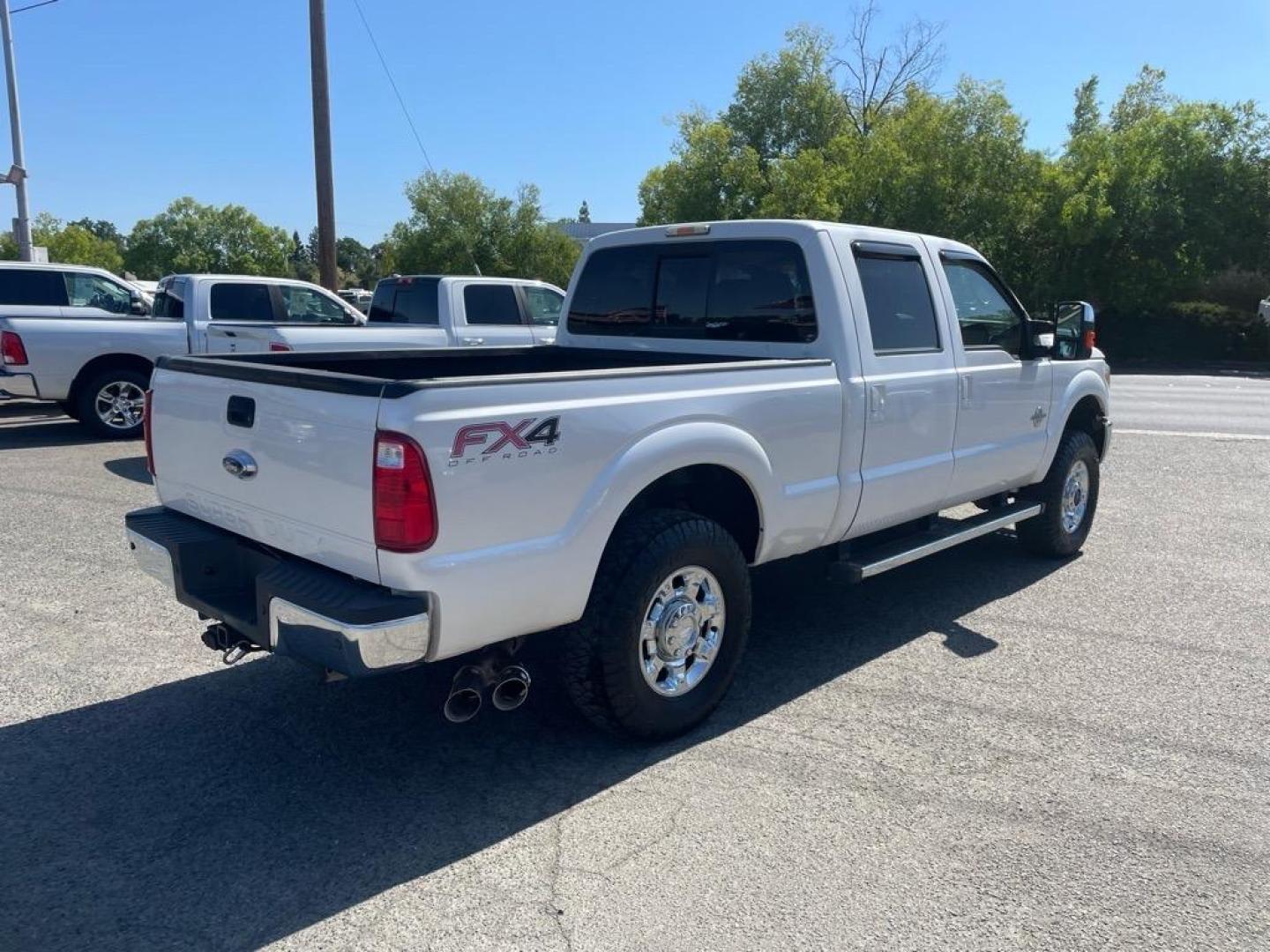 2013 Oxford White Ford F-250 Super Duty Lariat (1FT7W2BT4DE) with an 6.7L Power Stroke 6.7L Biodiesel Turbo V8 400hp 800ft. lbs. Common Rail Direct Injection engine, 6-Speed Shiftable Automatic transmission, located at 800 Riverside Ave, Roseville, CA, 95678, 916-773-4549 & Toll Free: 866-719-4393, 38.732265, -121.291039 - DIESEL CREW CAB 4X4 FX4 LARIAT MOON ROOF SERVICE RECORDS - Photo#3