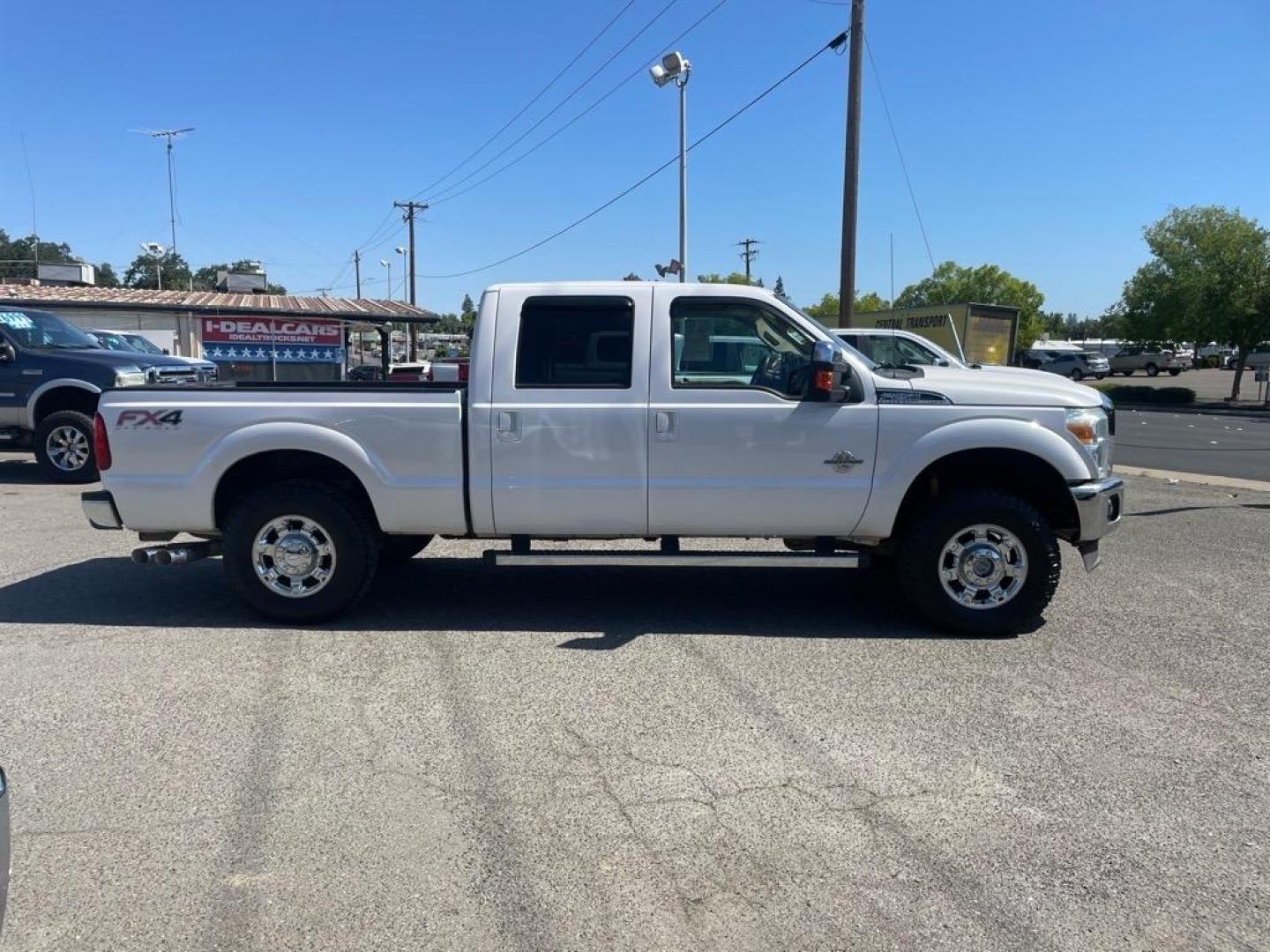 2013 Oxford White Ford F-250 Super Duty Lariat (1FT7W2BT4DE) with an 6.7L Power Stroke 6.7L Biodiesel Turbo V8 400hp 800ft. lbs. Common Rail Direct Injection engine, 6-Speed Shiftable Automatic transmission, located at 800 Riverside Ave, Roseville, CA, 95678, 916-773-4549 & Toll Free: 866-719-4393, 38.732265, -121.291039 - DIESEL CREW CAB 4X4 FX4 LARIAT MOON ROOF SERVICE RECORDS - Photo#5