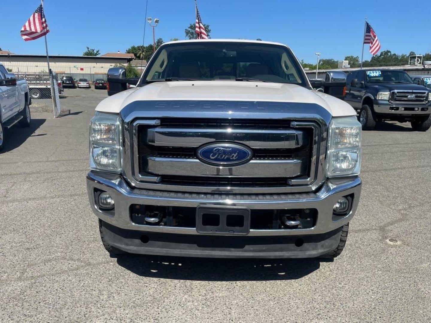 2013 Oxford White Ford F-250 Super Duty Lariat (1FT7W2BT4DE) with an 6.7L Power Stroke 6.7L Biodiesel Turbo V8 400hp 800ft. lbs. Common Rail Direct Injection engine, 6-Speed Shiftable Automatic transmission, located at 800 Riverside Ave, Roseville, CA, 95678, 916-773-4549 & Toll Free: 866-719-4393, 38.732265, -121.291039 - DIESEL CREW CAB 4X4 FX4 LARIAT MOON ROOF SERVICE RECORDS - Photo#6