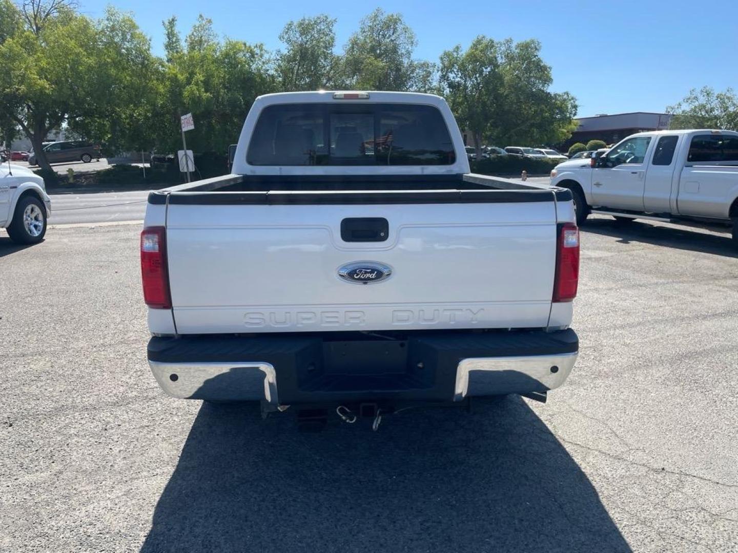 2013 Oxford White Ford F-250 Super Duty Lariat (1FT7W2BT4DE) with an 6.7L Power Stroke 6.7L Biodiesel Turbo V8 400hp 800ft. lbs. Common Rail Direct Injection engine, 6-Speed Shiftable Automatic transmission, located at 800 Riverside Ave, Roseville, CA, 95678, 916-773-4549 & Toll Free: 866-719-4393, 38.732265, -121.291039 - DIESEL CREW CAB 4X4 FX4 LARIAT MOON ROOF SERVICE RECORDS - Photo#7