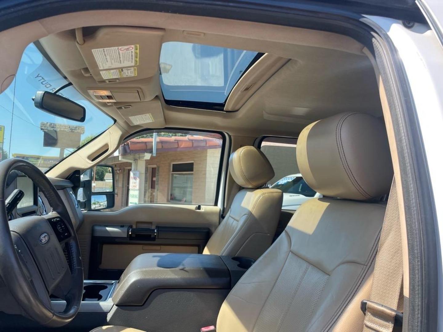 2013 Oxford White Ford F-250 Super Duty Lariat (1FT7W2BT4DE) with an 6.7L Power Stroke 6.7L Biodiesel Turbo V8 400hp 800ft. lbs. Common Rail Direct Injection engine, 6-Speed Shiftable Automatic transmission, located at 800 Riverside Ave, Roseville, CA, 95678, 916-773-4549 & Toll Free: 866-719-4393, 38.732265, -121.291039 - DIESEL CREW CAB 4X4 FX4 LARIAT MOON ROOF SERVICE RECORDS - Photo#9