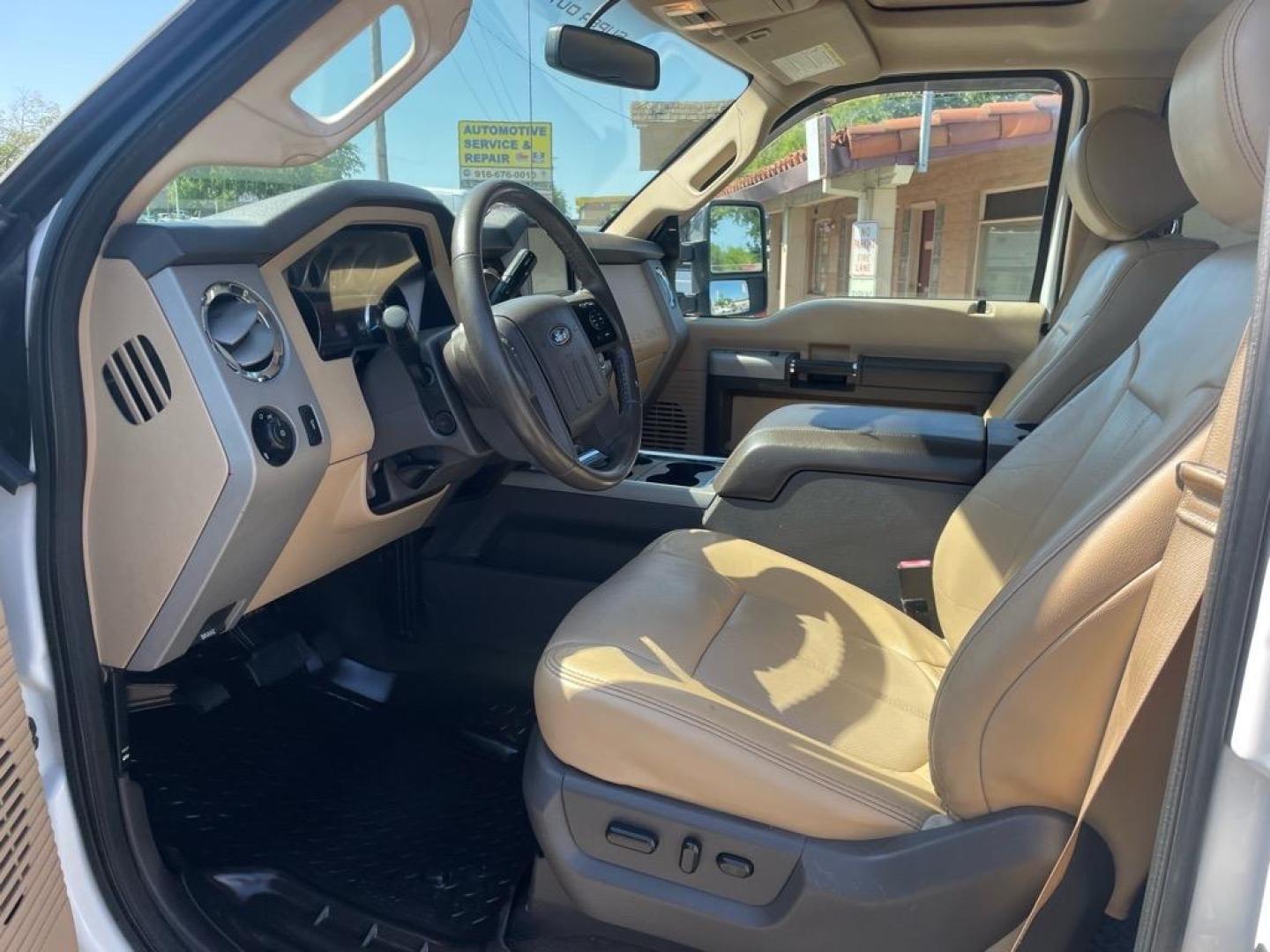 2013 Oxford White Ford F-250 Super Duty Lariat (1FT7W2BT4DE) with an 6.7L Power Stroke 6.7L Biodiesel Turbo V8 400hp 800ft. lbs. Common Rail Direct Injection engine, 6-Speed Shiftable Automatic transmission, located at 800 Riverside Ave, Roseville, CA, 95678, 916-773-4549 & Toll Free: 866-719-4393, 38.732265, -121.291039 - DIESEL CREW CAB 4X4 FX4 LARIAT MOON ROOF SERVICE RECORDS - Photo#10