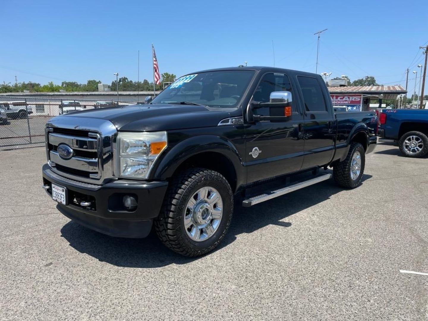 2013 Tuxedo Black Metallic Ford F-250 Super Duty Lariat (1FT7W2BT4DE) with an 6.7L Power Stroke 6.7L Biodiesel Turbo V8 400hp 800ft. lbs. Common Rail Direct Injection engine, 6-Speed Shiftable Automatic transmission, located at 800 Riverside Ave, Roseville, CA, 95678, 916-773-4549 & Toll Free: 866-719-4393, 38.732265, -121.291039 - DIESEL CREW CAB 4X4 FX4 LARIAT SERVICE RECORDS NEW TIRES - Photo#0