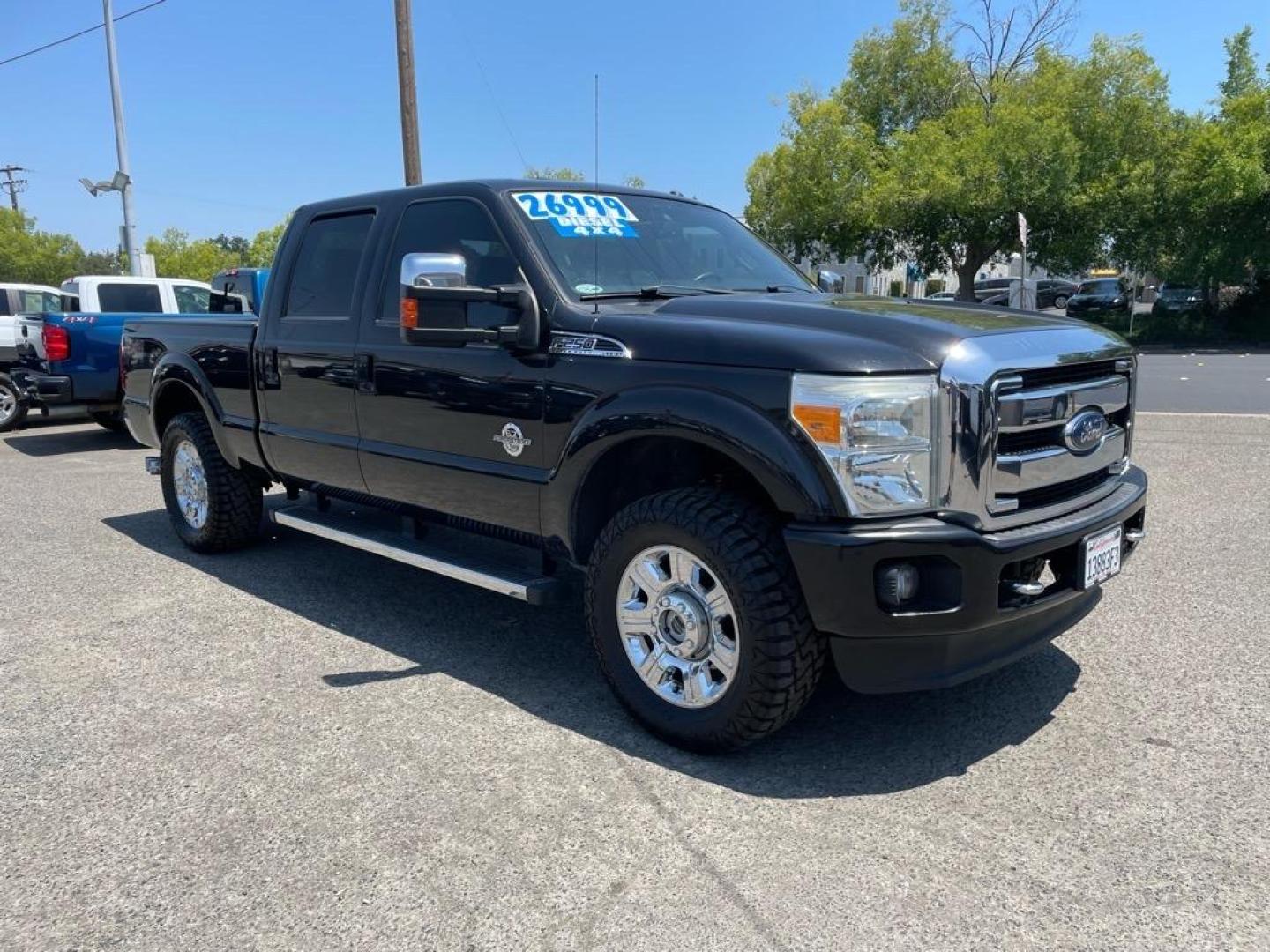 2013 Tuxedo Black Metallic Ford F-250 Super Duty Lariat (1FT7W2BT4DE) with an 6.7L Power Stroke 6.7L Biodiesel Turbo V8 400hp 800ft. lbs. Common Rail Direct Injection engine, 6-Speed Shiftable Automatic transmission, located at 800 Riverside Ave, Roseville, CA, 95678, 916-773-4549 & Toll Free: 866-719-4393, 38.732265, -121.291039 - DIESEL CREW CAB 4X4 FX4 LARIAT SERVICE RECORDS NEW TIRES - Photo#1