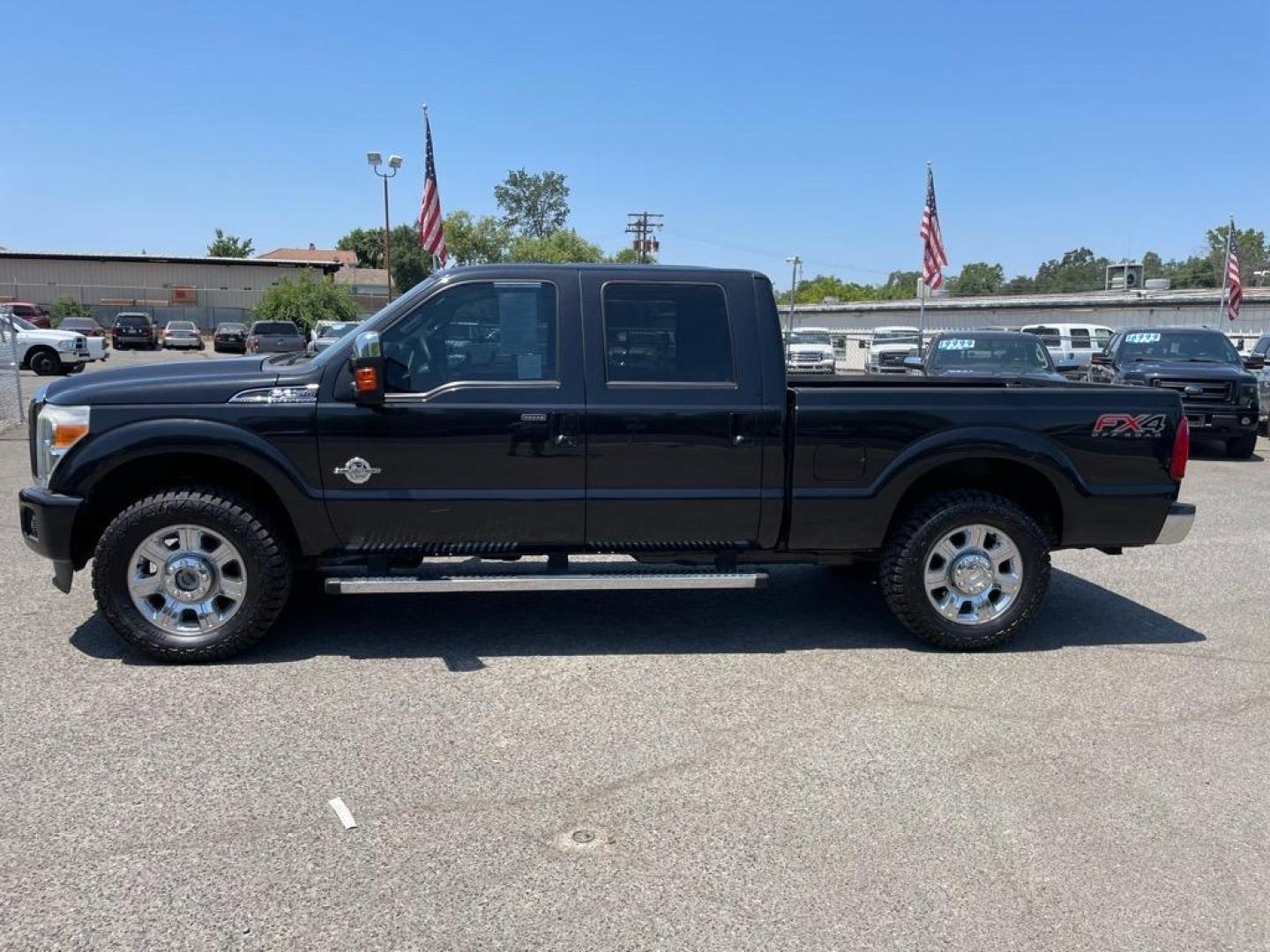 2013 Tuxedo Black Metallic Ford F-250 Super Duty Lariat (1FT7W2BT4DE) with an 6.7L Power Stroke 6.7L Biodiesel Turbo V8 400hp 800ft. lbs. Common Rail Direct Injection engine, 6-Speed Shiftable Automatic transmission, located at 800 Riverside Ave, Roseville, CA, 95678, 916-773-4549 & Toll Free: 866-719-4393, 38.732265, -121.291039 - DIESEL CREW CAB 4X4 FX4 LARIAT SERVICE RECORDS NEW TIRES - Photo#4