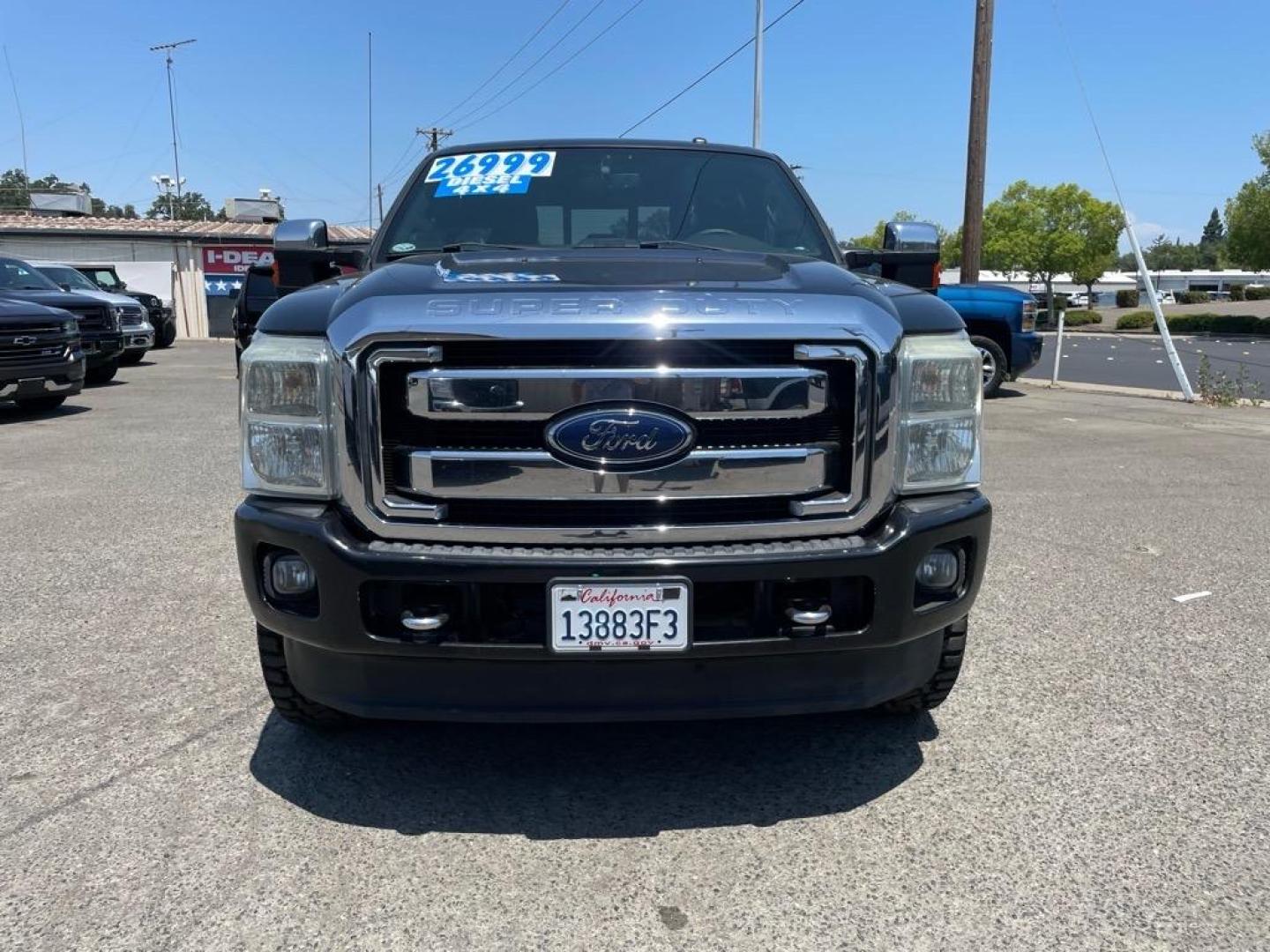 2013 Tuxedo Black Metallic Ford F-250 Super Duty Lariat (1FT7W2BT4DE) with an 6.7L Power Stroke 6.7L Biodiesel Turbo V8 400hp 800ft. lbs. Common Rail Direct Injection engine, 6-Speed Shiftable Automatic transmission, located at 800 Riverside Ave, Roseville, CA, 95678, 916-773-4549 & Toll Free: 866-719-4393, 38.732265, -121.291039 - DIESEL CREW CAB 4X4 FX4 LARIAT SERVICE RECORDS NEW TIRES - Photo#7