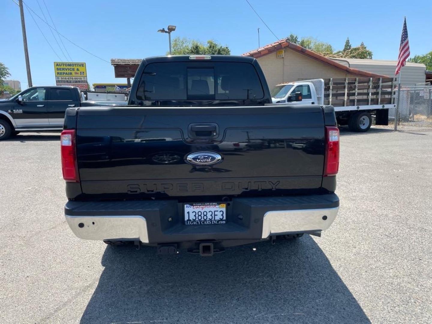 2013 Tuxedo Black Metallic Ford F-250 Super Duty Lariat (1FT7W2BT4DE) with an 6.7L Power Stroke 6.7L Biodiesel Turbo V8 400hp 800ft. lbs. Common Rail Direct Injection engine, 6-Speed Shiftable Automatic transmission, located at 800 Riverside Ave, Roseville, CA, 95678, 916-773-4549 & Toll Free: 866-719-4393, 38.732265, -121.291039 - DIESEL CREW CAB 4X4 FX4 LARIAT SERVICE RECORDS NEW TIRES - Photo#8