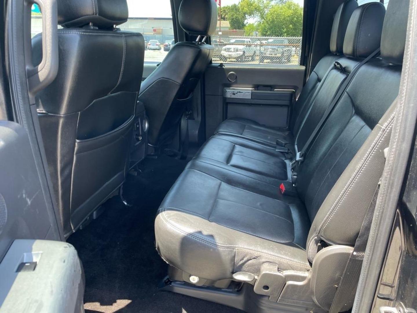 2013 Tuxedo Black Metallic Ford F-250 Super Duty Lariat (1FT7W2BT4DE) with an 6.7L Power Stroke 6.7L Biodiesel Turbo V8 400hp 800ft. lbs. Common Rail Direct Injection engine, 6-Speed Shiftable Automatic transmission, located at 800 Riverside Ave, Roseville, CA, 95678, 916-773-4549 & Toll Free: 866-719-4393, 38.732265, -121.291039 - DIESEL CREW CAB 4X4 FX4 LARIAT SERVICE RECORDS NEW TIRES - Photo#11