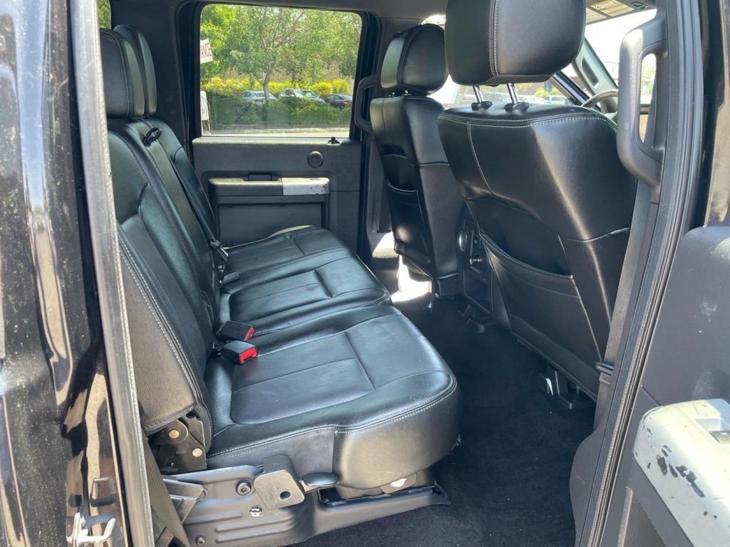 2013 Tuxedo Black Metallic Ford F-250 Super Duty Lariat (1FT7W2BT4DE) with an 6.7L Power Stroke 6.7L Biodiesel Turbo V8 400hp 800ft. lbs. Common Rail Direct Injection engine, 6-Speed Shiftable Automatic transmission, located at 800 Riverside Ave, Roseville, CA, 95678, 916-773-4549 & Toll Free: 866-719-4393, 38.732265, -121.291039 - DIESEL CREW CAB 4X4 FX4 LARIAT SERVICE RECORDS NEW TIRES - Photo#13