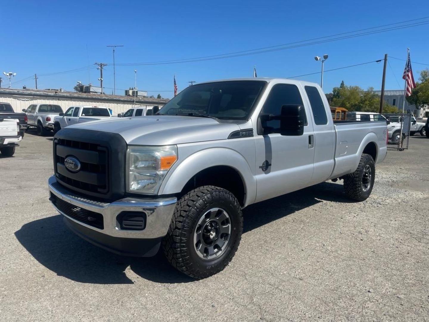 2013 Ingot Silver Metallic Ford F-250 Super Duty XL (1FT7X2BT6DE) with an 6.7L Power Stroke 6.7L Biodiesel Turbo V8 400hp 800ft. lbs. Common Rail Direct Injection engine, 6-Speed Shiftable Automatic transmission, located at 800 Riverside Ave, Roseville, CA, 95678, 916-773-4549 & Toll Free: 866-719-4393, 38.732265, -121.291039 - SUPER CAB DIESEL CLEAN CARFAX - Photo#0