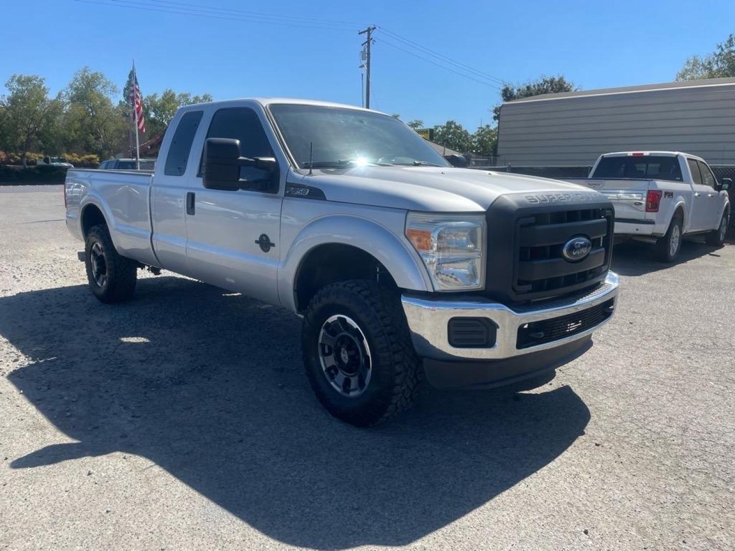2013 Ingot Silver Metallic Ford F-250 Super Duty XL (1FT7X2BT6DE) with an 6.7L Power Stroke 6.7L Biodiesel Turbo V8 400hp 800ft. lbs. Common Rail Direct Injection engine, 6-Speed Shiftable Automatic transmission, located at 800 Riverside Ave, Roseville, CA, 95678, 916-773-4549 & Toll Free: 866-719-4393, 38.732265, -121.291039 - SUPER CAB DIESEL CLEAN CARFAX - Photo#1