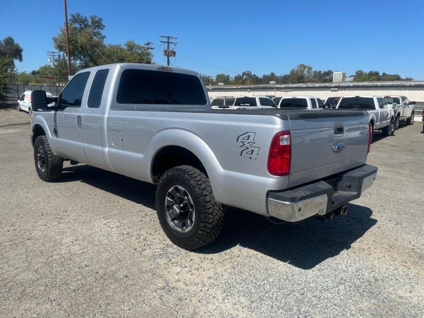 2013 Ingot Silver Metallic Ford F-250 Super Duty XL (1FT7X2BT6DE) with an 6.7L Power Stroke 6.7L Biodiesel Turbo V8 400hp 800ft. lbs. Common Rail Direct Injection engine, 6-Speed Shiftable Automatic transmission, located at 800 Riverside Ave, Roseville, CA, 95678, 916-773-4549 & Toll Free: 866-719-4393, 38.732265, -121.291039 - SUPER CAB DIESEL CLEAN CARFAX - Photo#2