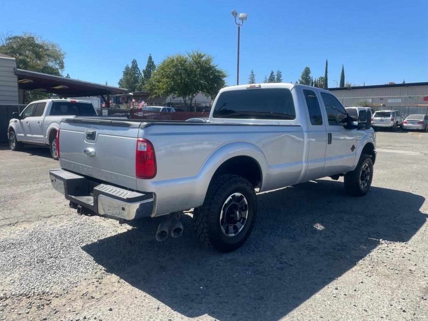 2013 Ingot Silver Metallic Ford F-250 Super Duty XL (1FT7X2BT6DE) with an 6.7L Power Stroke 6.7L Biodiesel Turbo V8 400hp 800ft. lbs. Common Rail Direct Injection engine, 6-Speed Shiftable Automatic transmission, located at 800 Riverside Ave, Roseville, CA, 95678, 916-773-4549 & Toll Free: 866-719-4393, 38.732265, -121.291039 - SUPER CAB DIESEL CLEAN CARFAX - Photo#3