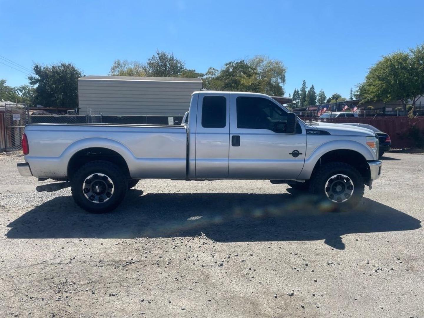 2013 Ingot Silver Metallic Ford F-250 Super Duty XL (1FT7X2BT6DE) with an 6.7L Power Stroke 6.7L Biodiesel Turbo V8 400hp 800ft. lbs. Common Rail Direct Injection engine, 6-Speed Shiftable Automatic transmission, located at 800 Riverside Ave, Roseville, CA, 95678, 916-773-4549 & Toll Free: 866-719-4393, 38.732265, -121.291039 - SUPER CAB DIESEL CLEAN CARFAX - Photo#5